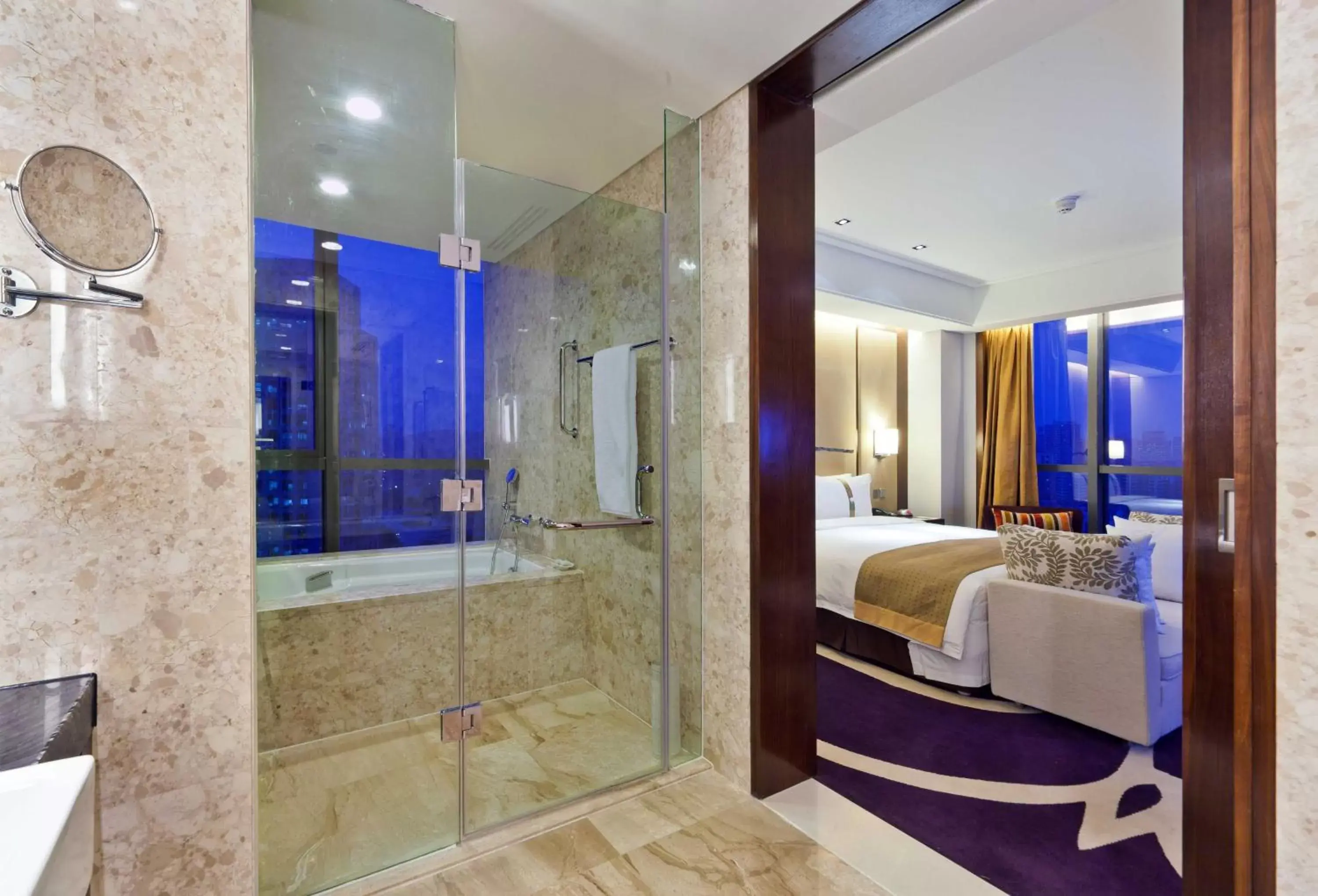 Bedroom, Bathroom in Holiday Inn Qingdao City Center, an IHG Hotel - Shopping MALL