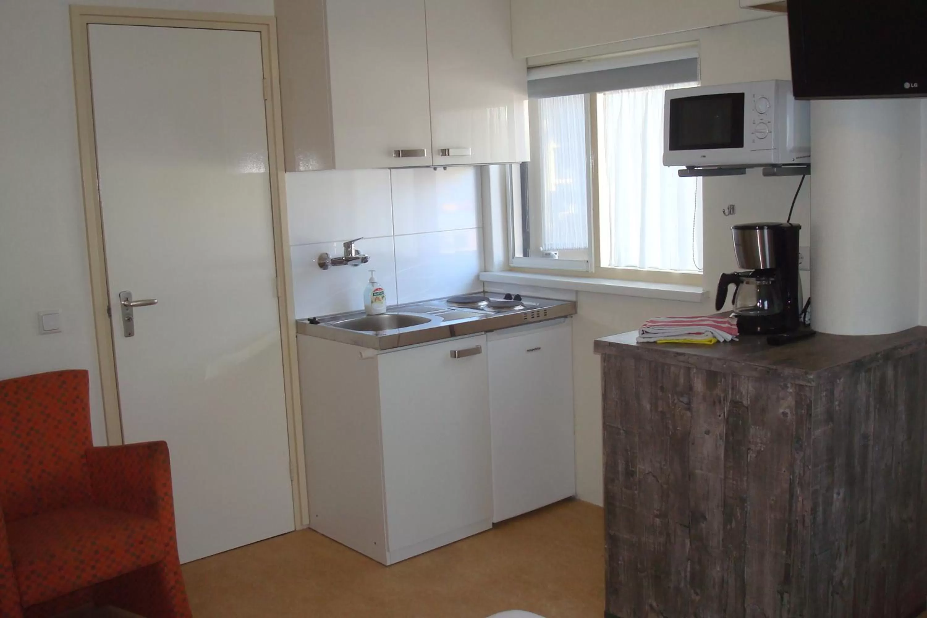 Kitchen or kitchenette in Hotel Rasch