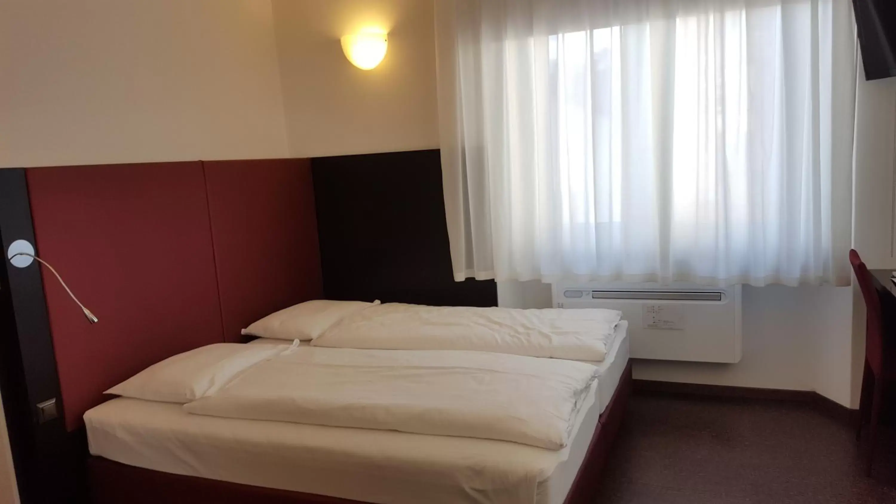 Bed in Hotel Rio Garni