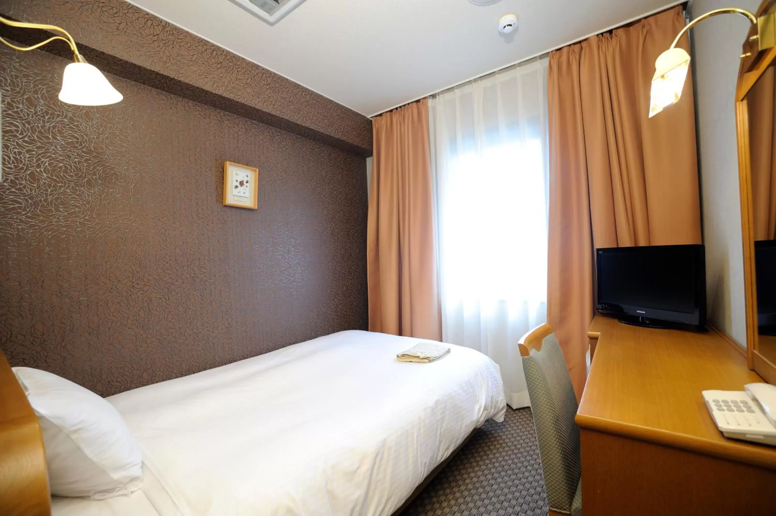 Photo of the whole room, Bed in Hotel Eclair Hakata