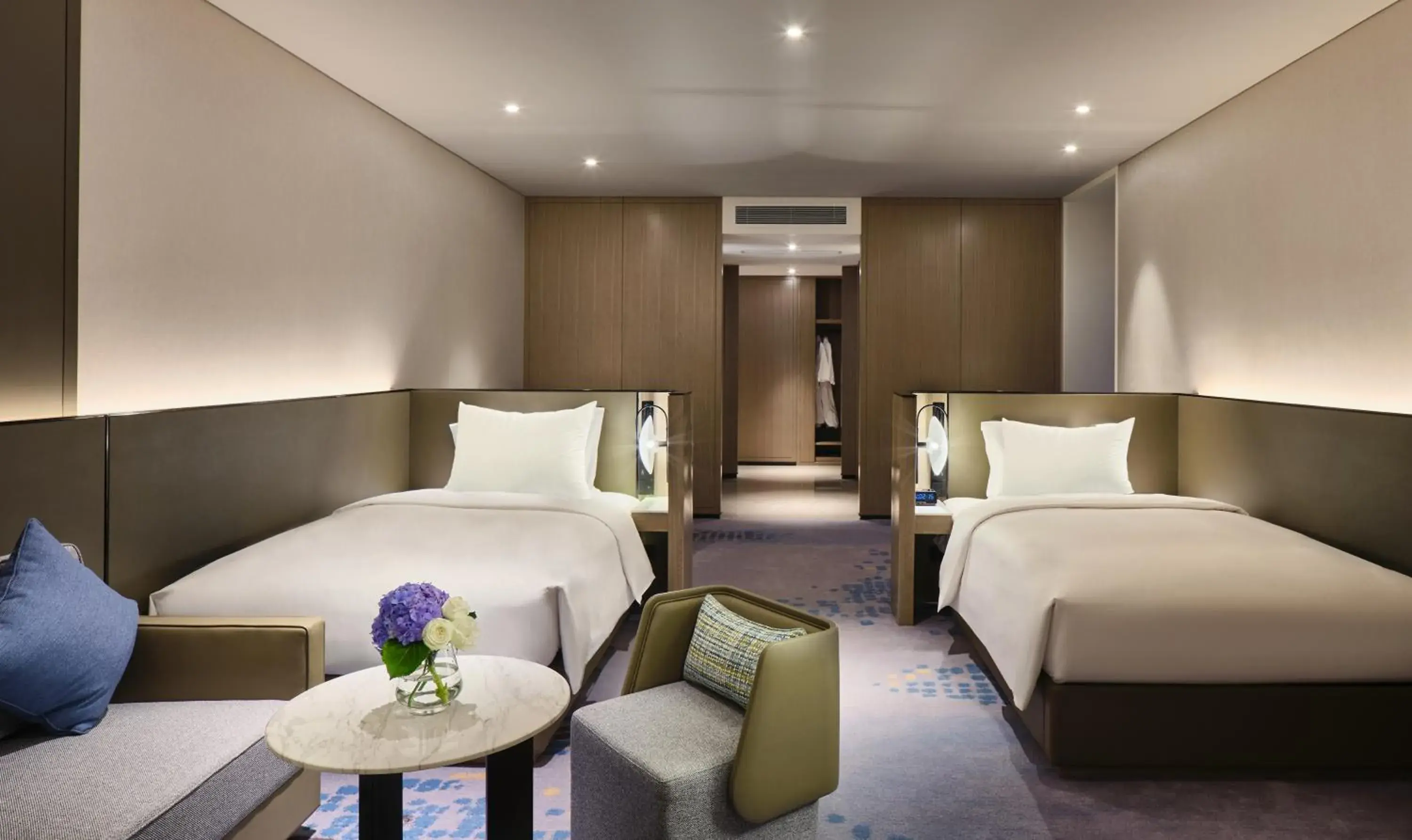 Bed in Crowne Plaza Wuhan Development Zone, an IHG Hotel