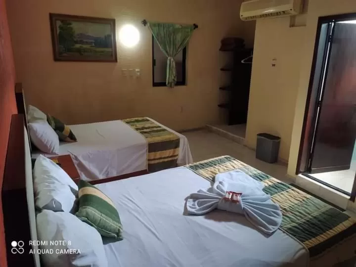 Bedroom in HOTEL MERIDA