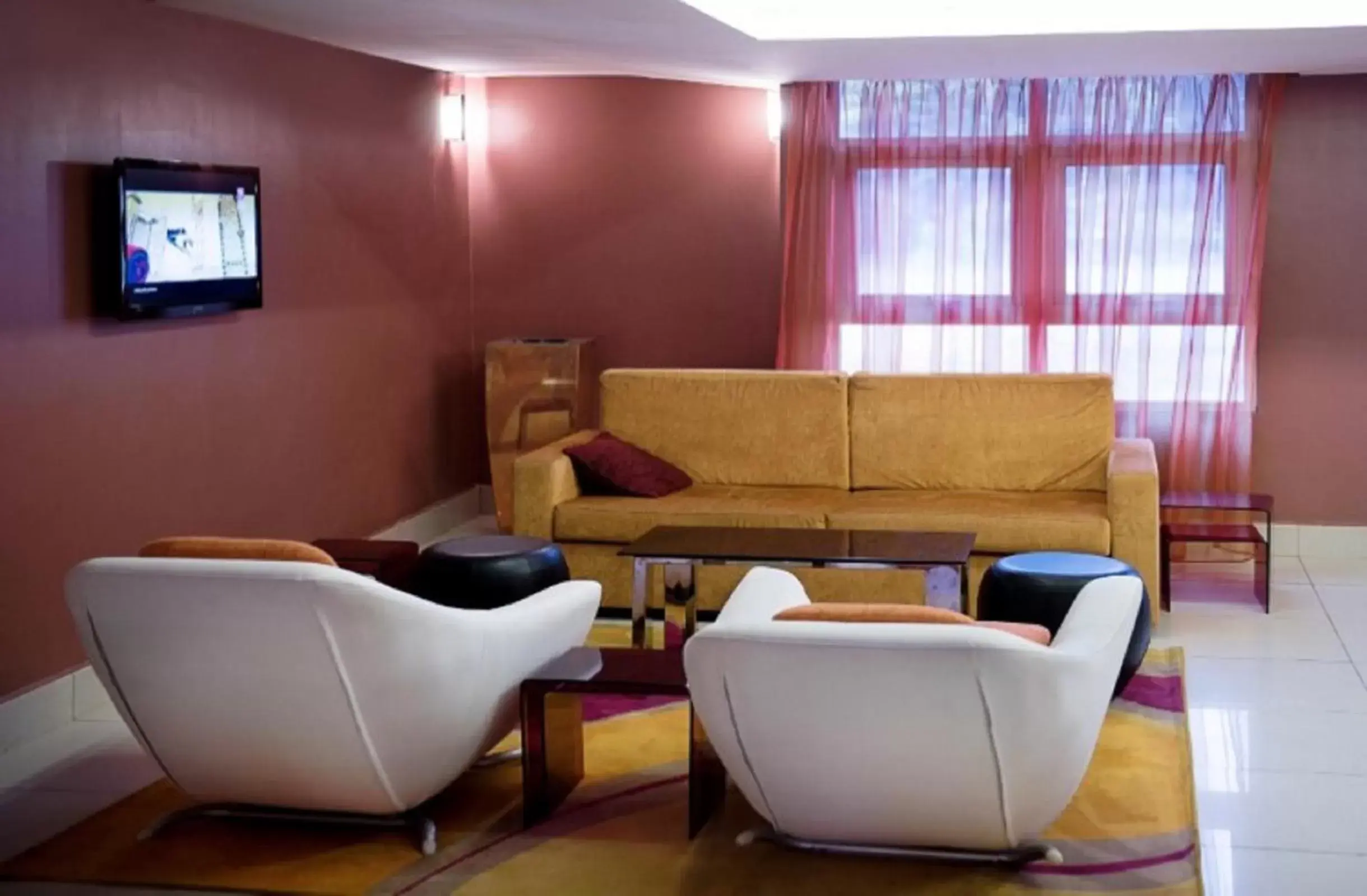 Communal lounge/ TV room, Seating Area in Park Inn by Radisson Abeokuta