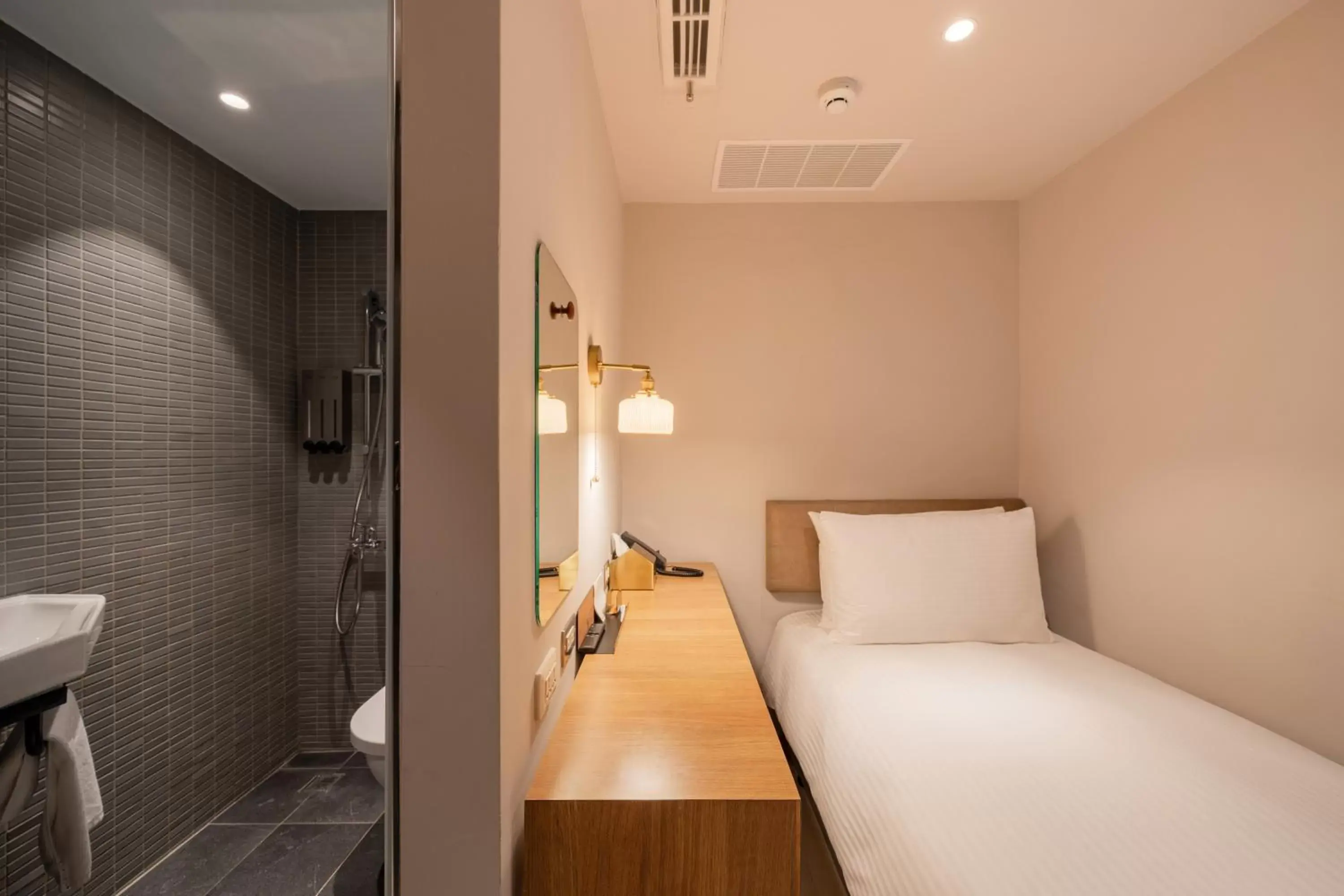 Bed, Bathroom in Inns Hotel