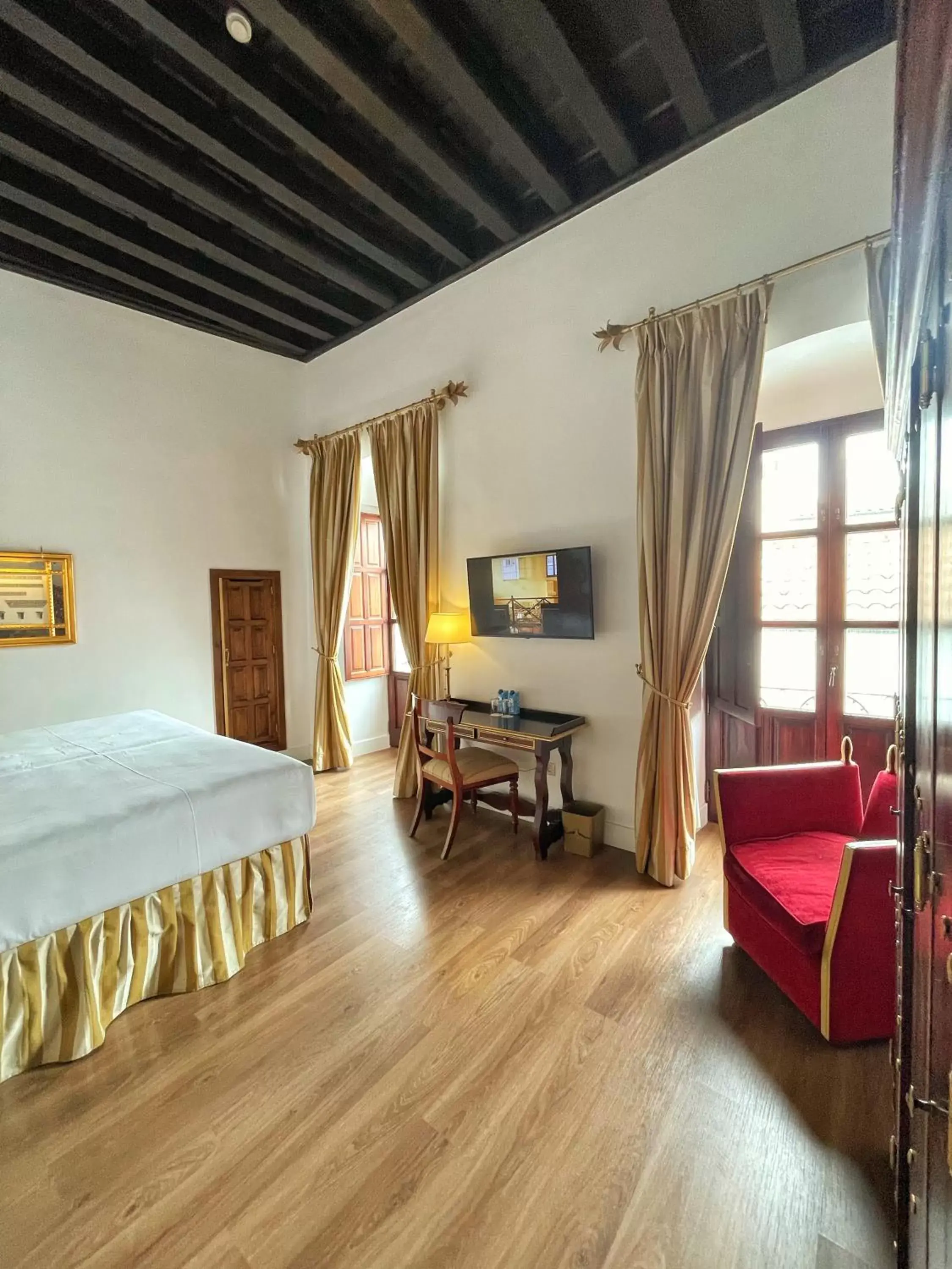 Bedroom, TV/Entertainment Center in Las Casas de la Judería de Córdoba