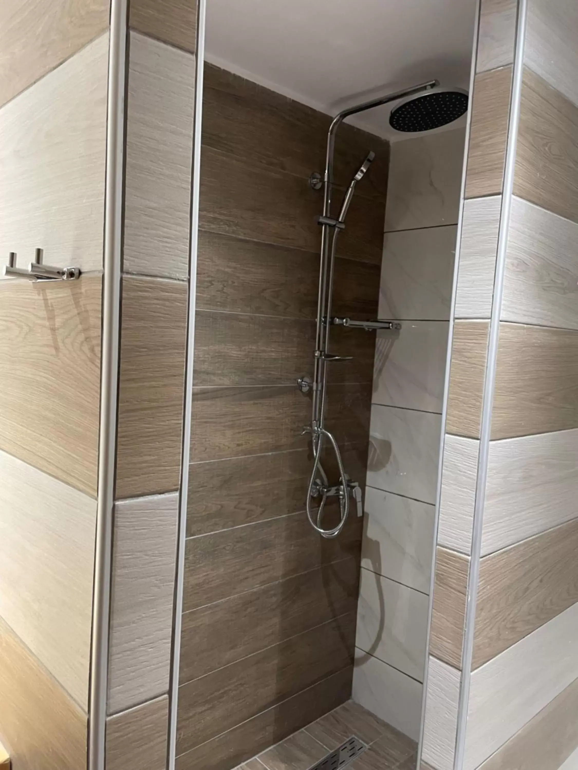 Shower, Bathroom in Hotel Kourkoumelata