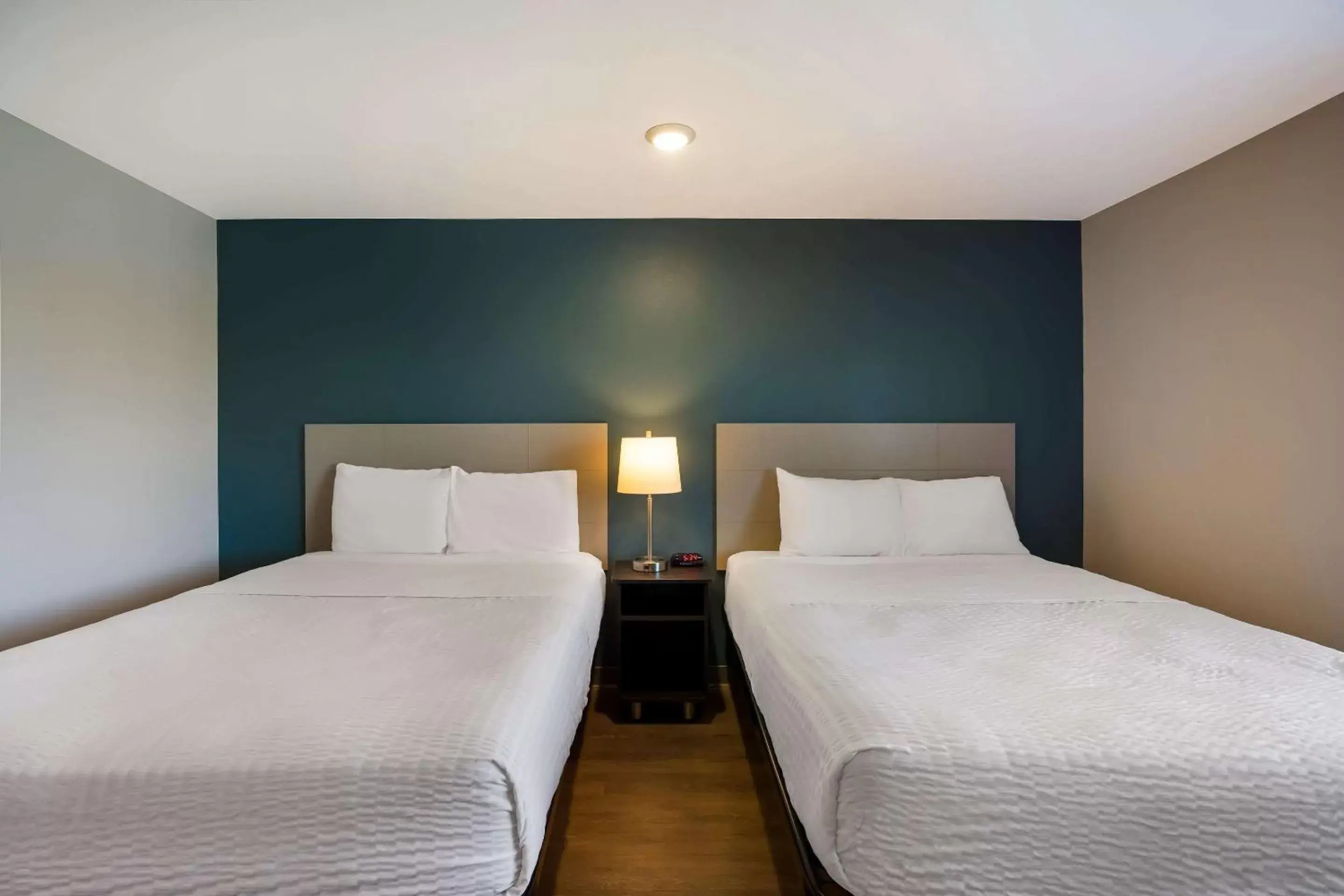 Bedroom, Bed in WoodSpring Suites Orlando West - Clermont