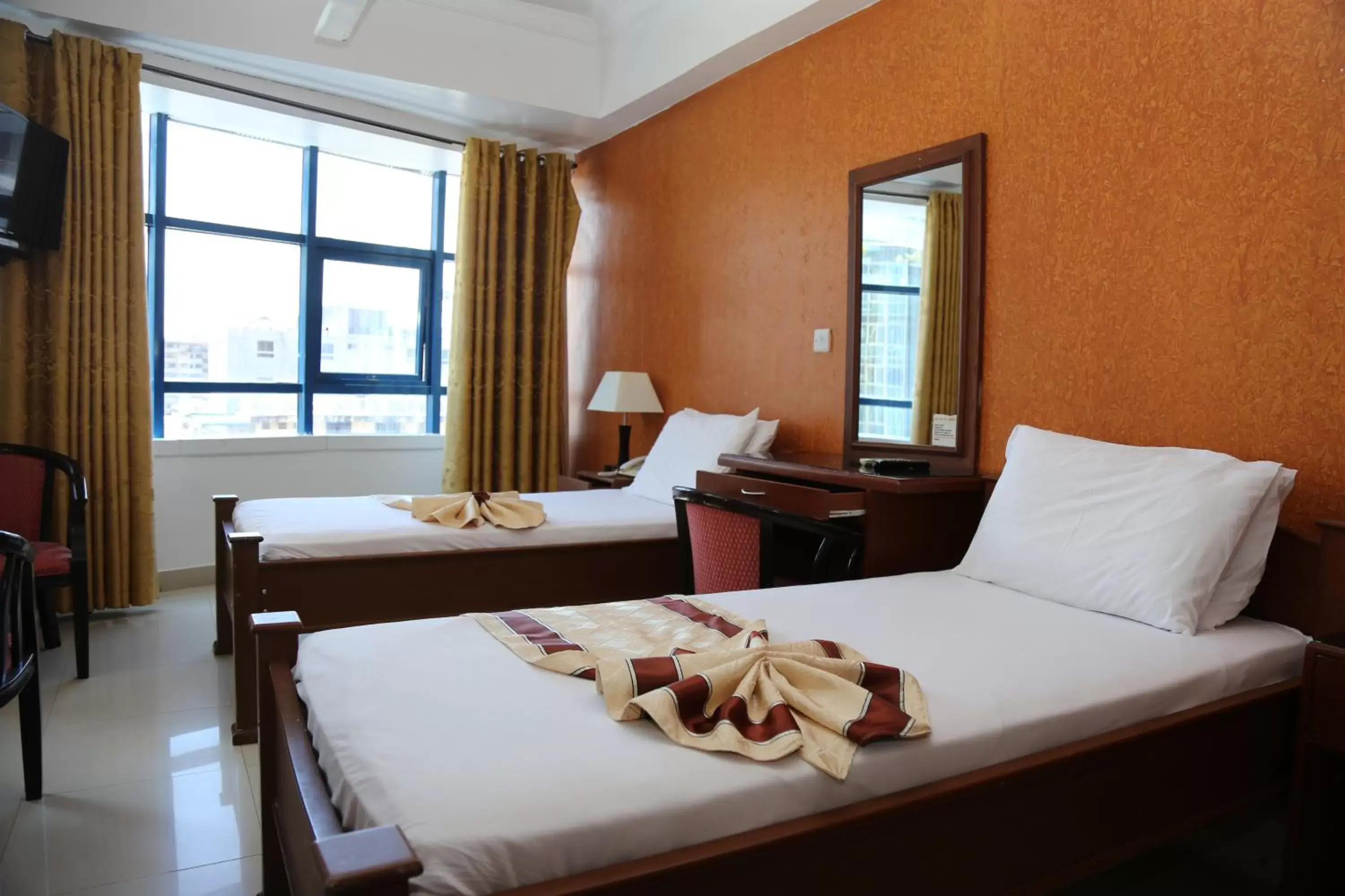 Bed in Rainbow Hotel Bed in Rainbow Hotel