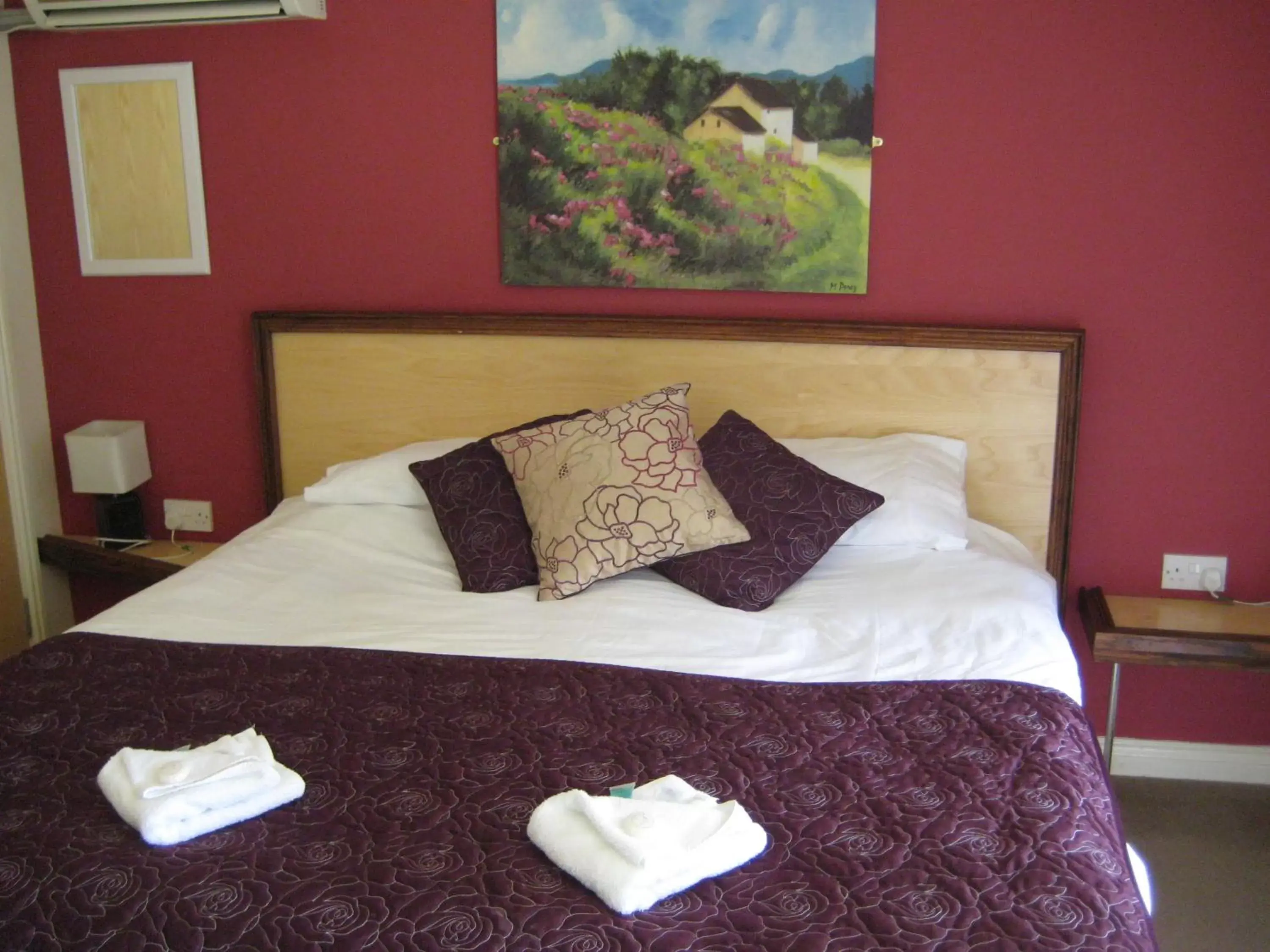 Bed in The Lord Byron Inn