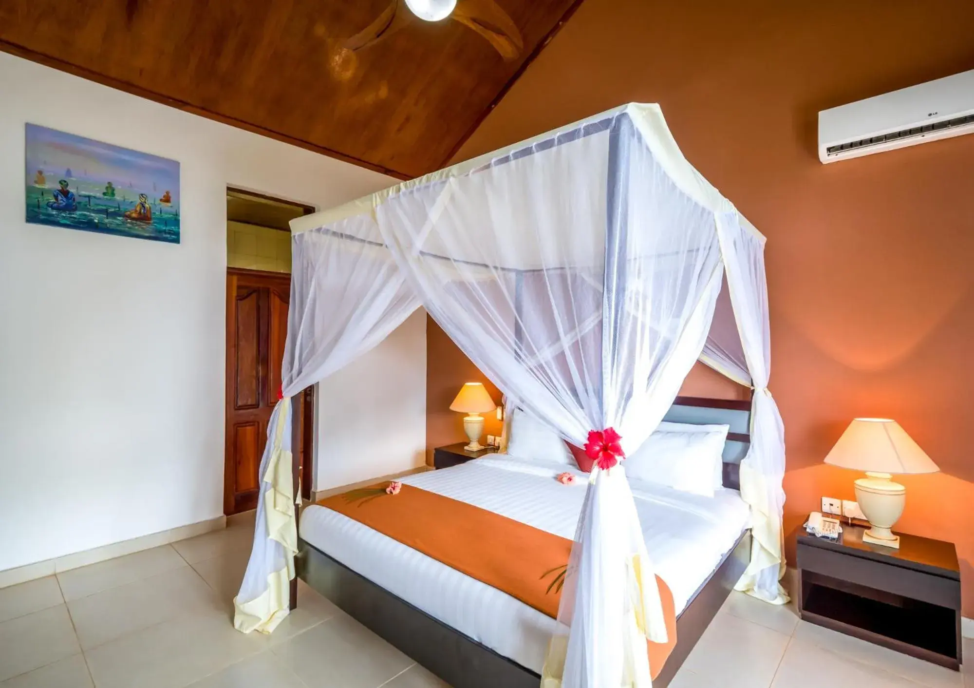 Bed in Azao Resort & Spa