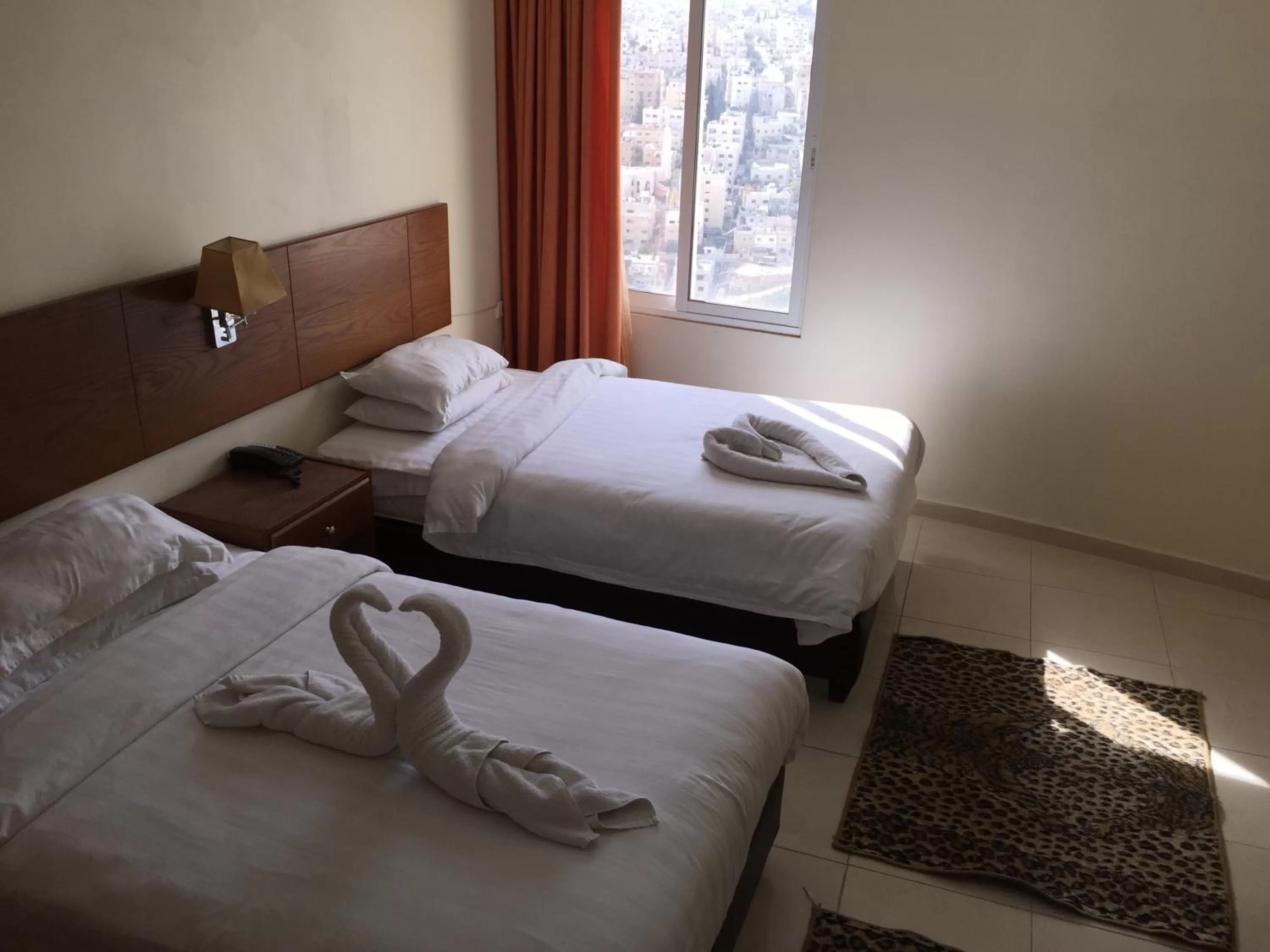 Bed in Zaina Plaza Hotel