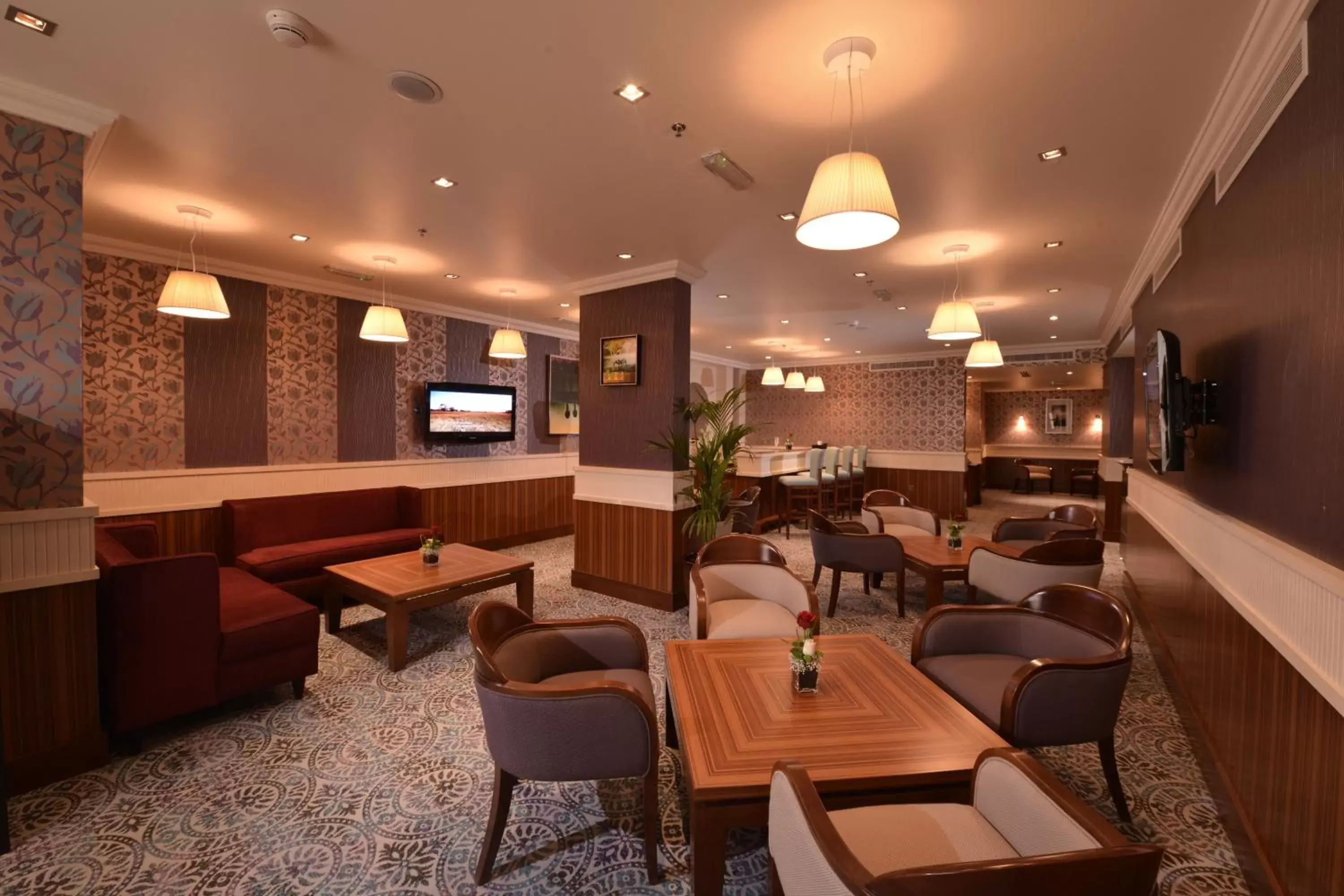 Lounge or bar in City Seasons Al Hamra Hotel Lounge or bar in City Seasons Al Hamra Hotel