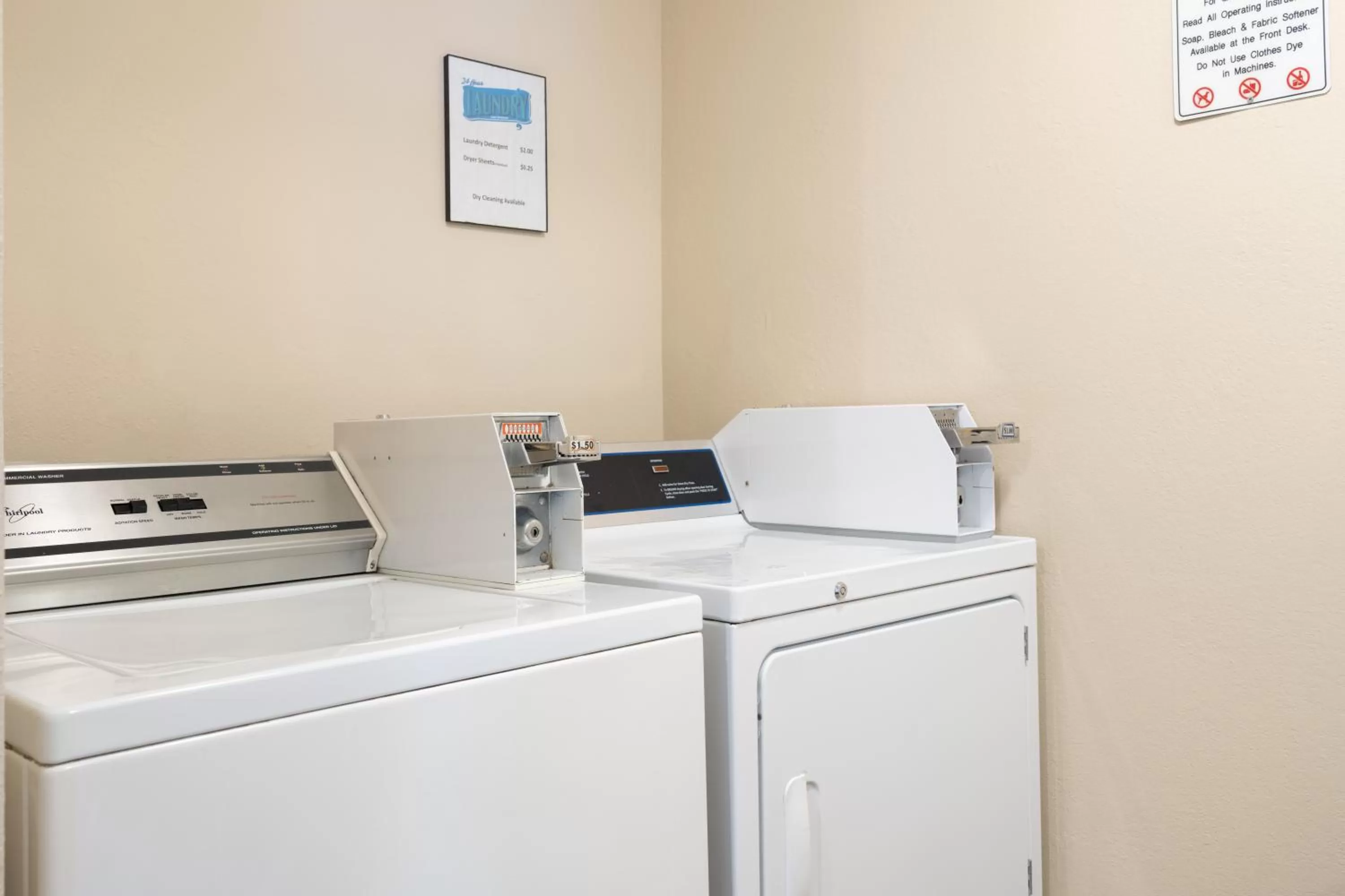 washing machine in AmericInn by Wyndham Cedar Rapids North