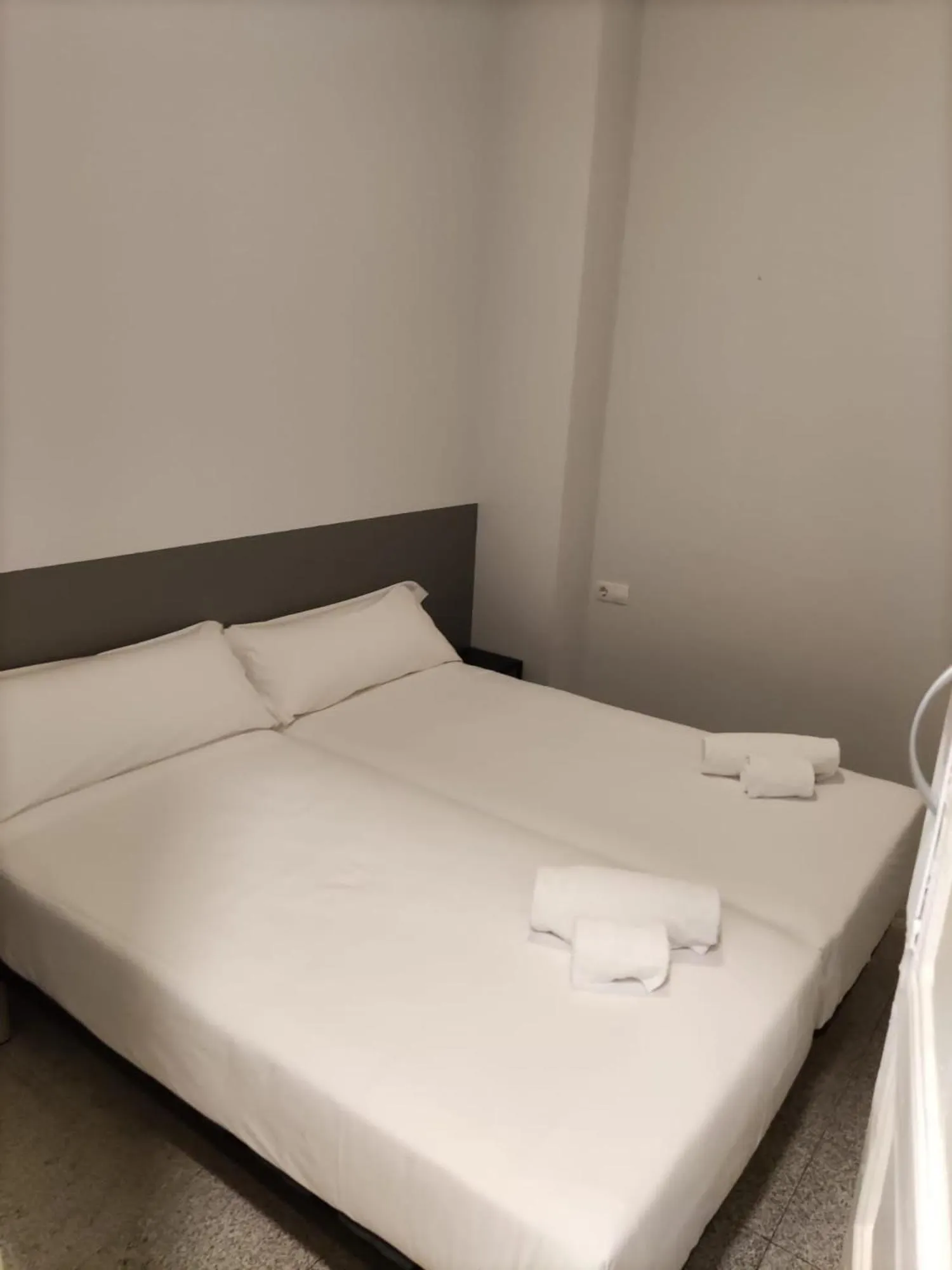 Bed in Hotel Monegal