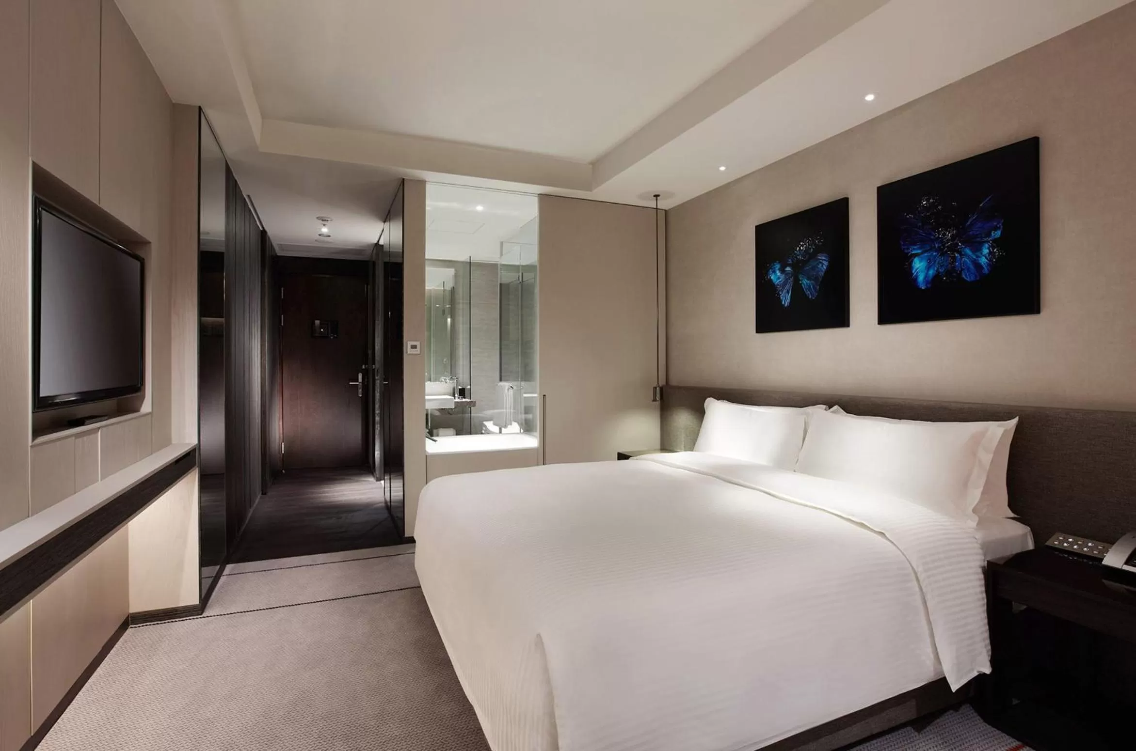 Bed in Humble House Taipei, Curio Collection by Hilton