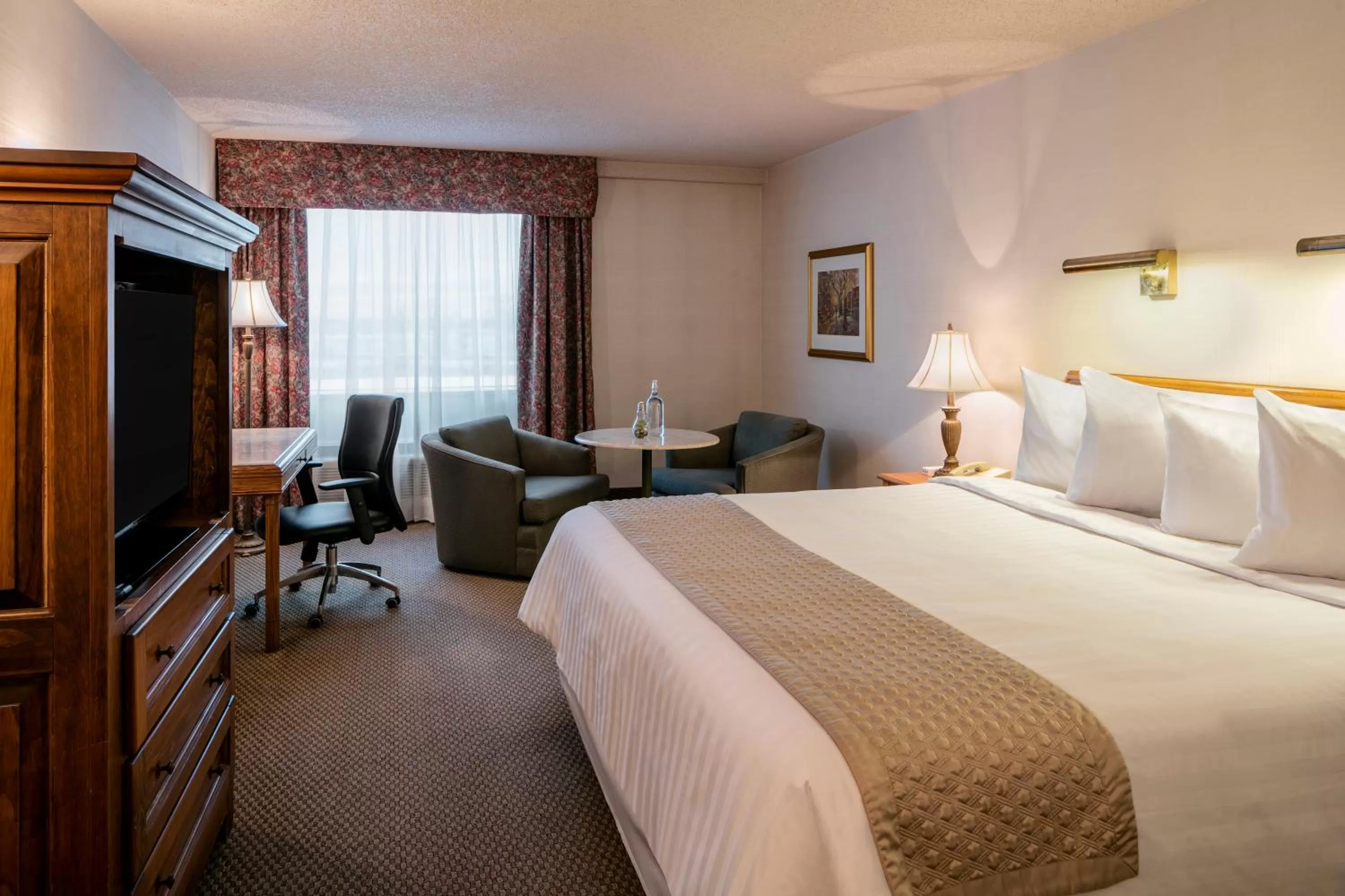 Bed in Hôtels Gouverneur Montréal - Île Charron