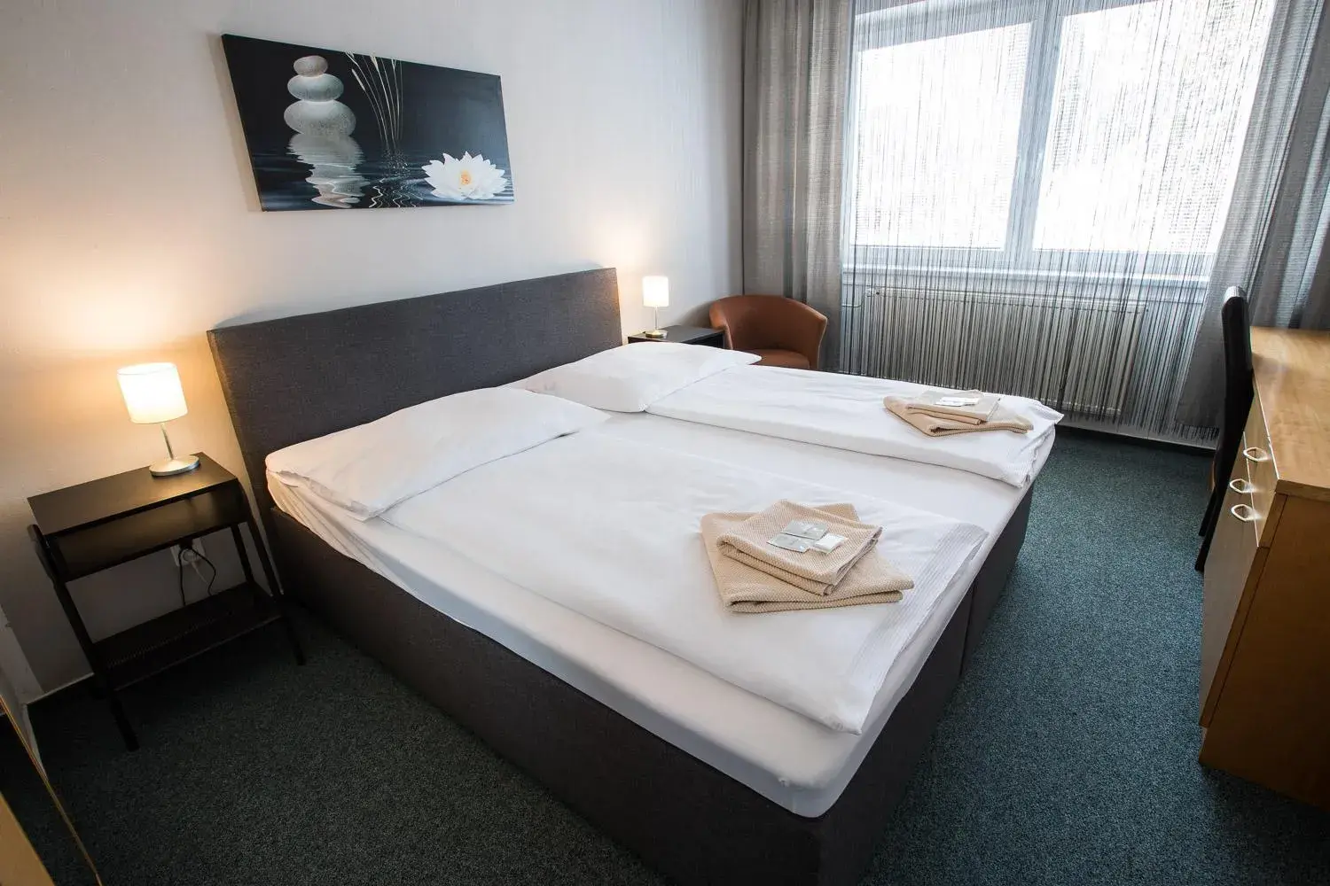 Bed in A-Sport Hotel