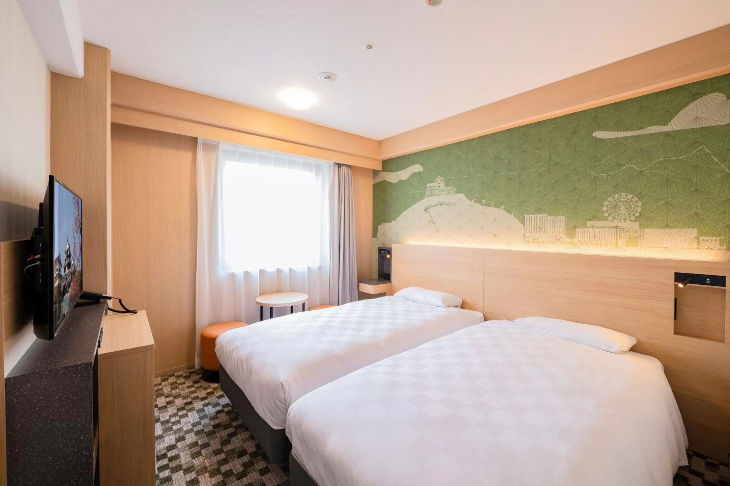 Bed in Matsuyama Tokyu REI Hotel