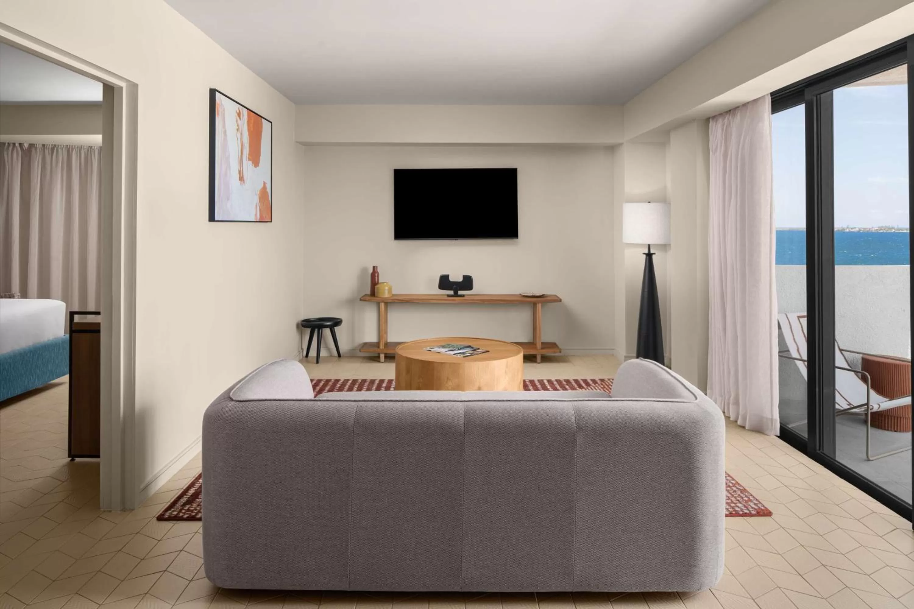 Living room, Bed in ROK Hotel Kingston, Tapestry Collection By Hilton