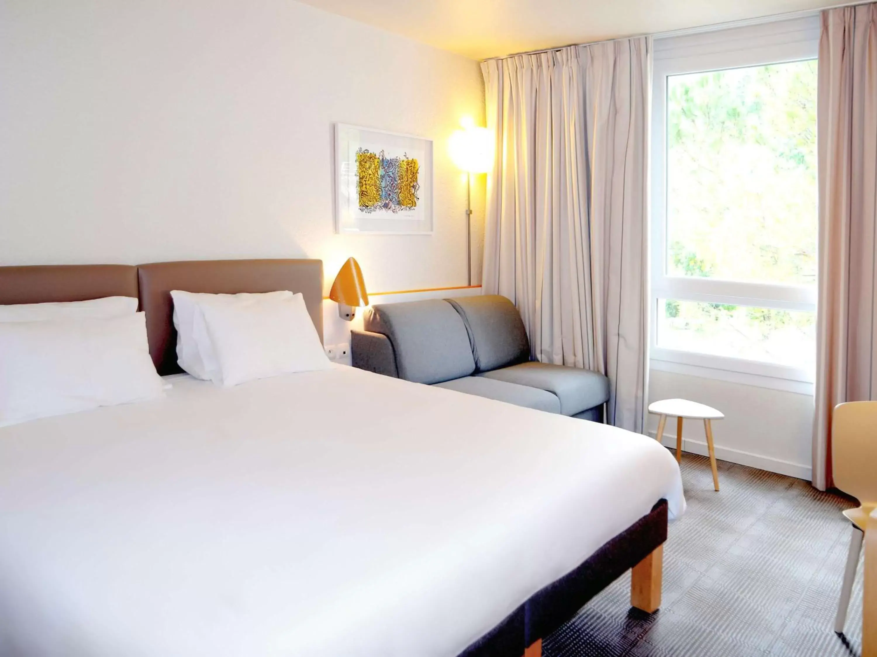 Photo of the whole room, Bed in Novotel Grenoble Nord Voreppe