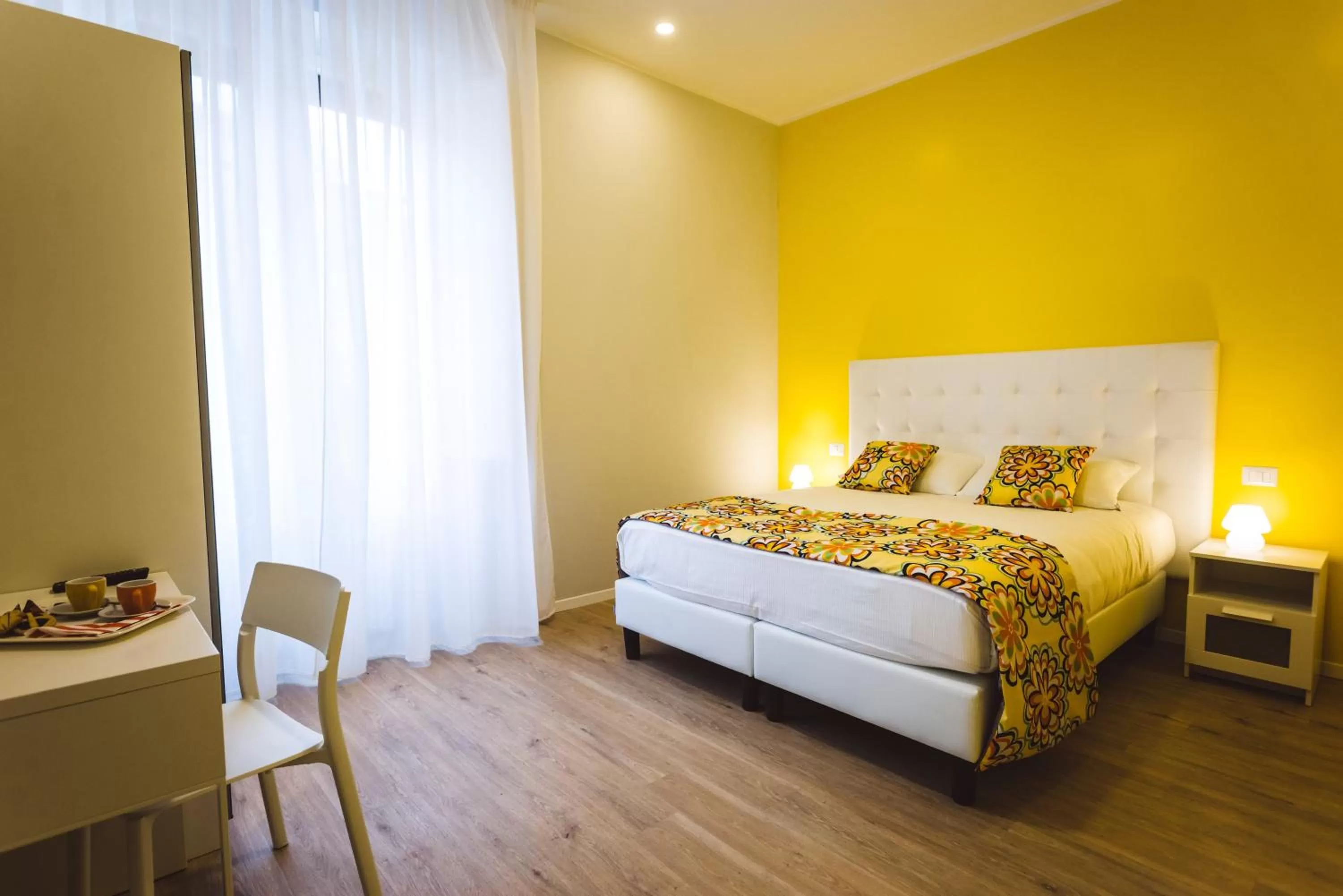 Bed in Angelina Rooms in Rome