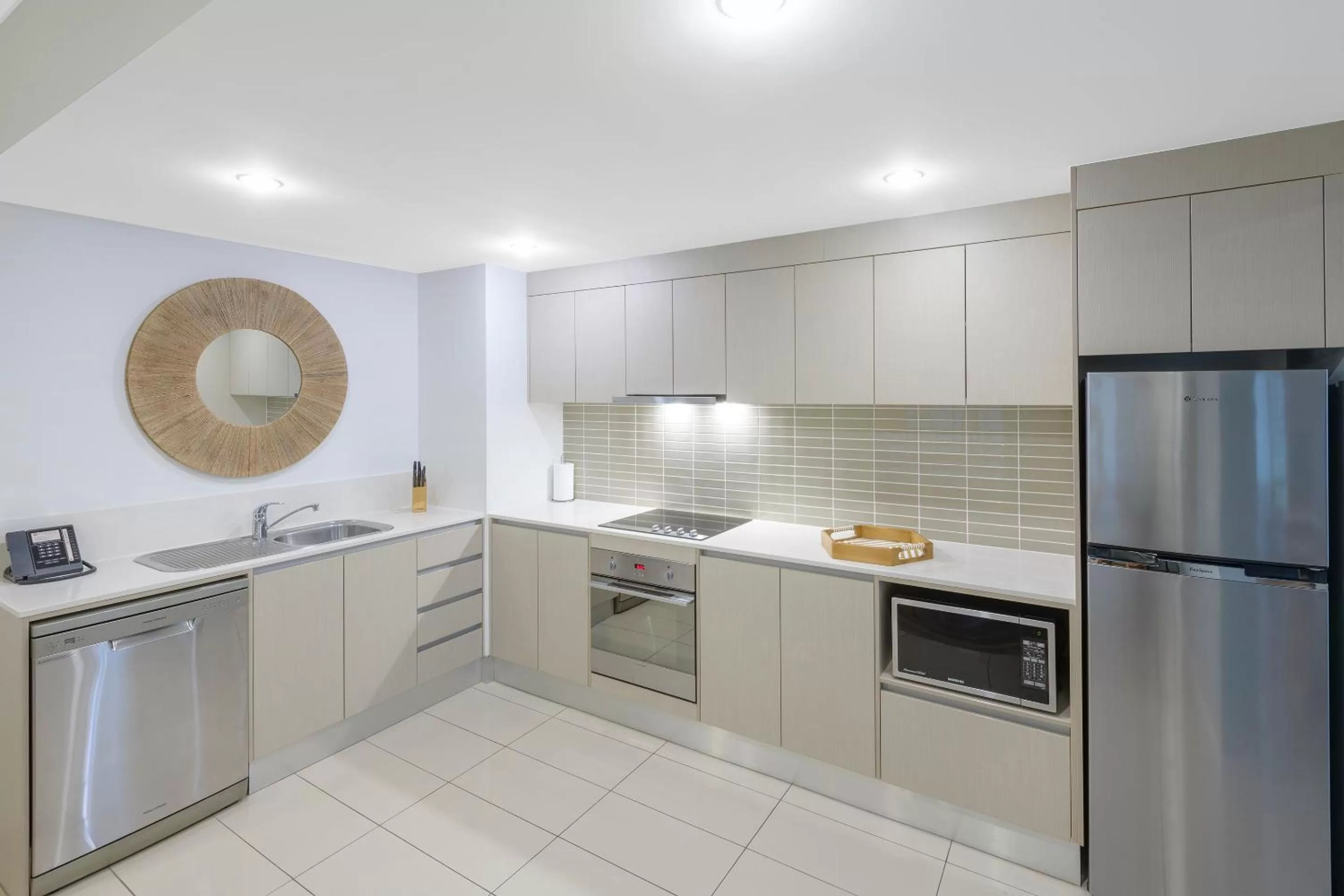 Kitchen or kitchenette in Ramada Resort by Wyndham Port Douglas