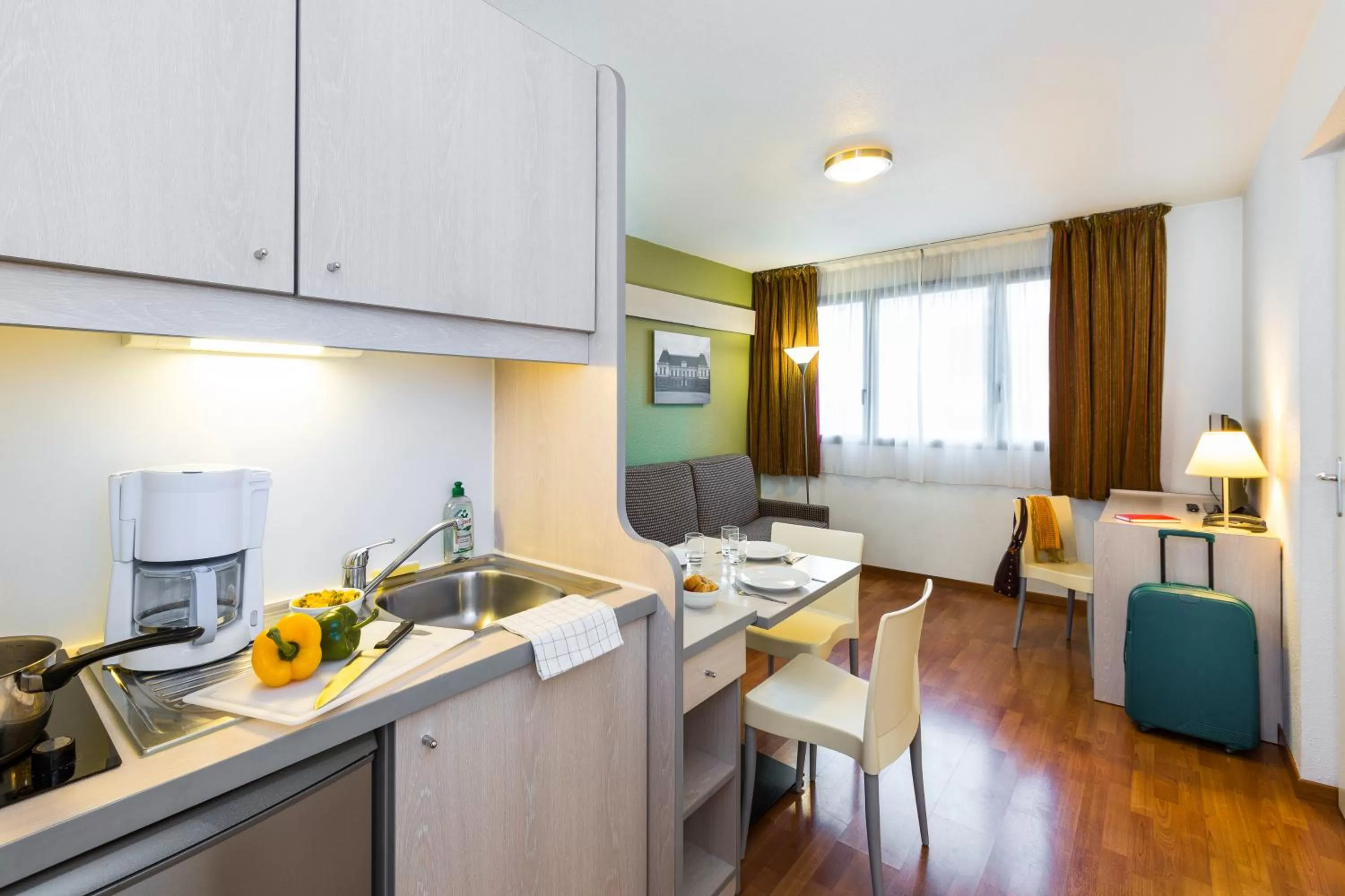 Kitchen or kitchenette in Aparthotel Adagio Access Rennes Centre