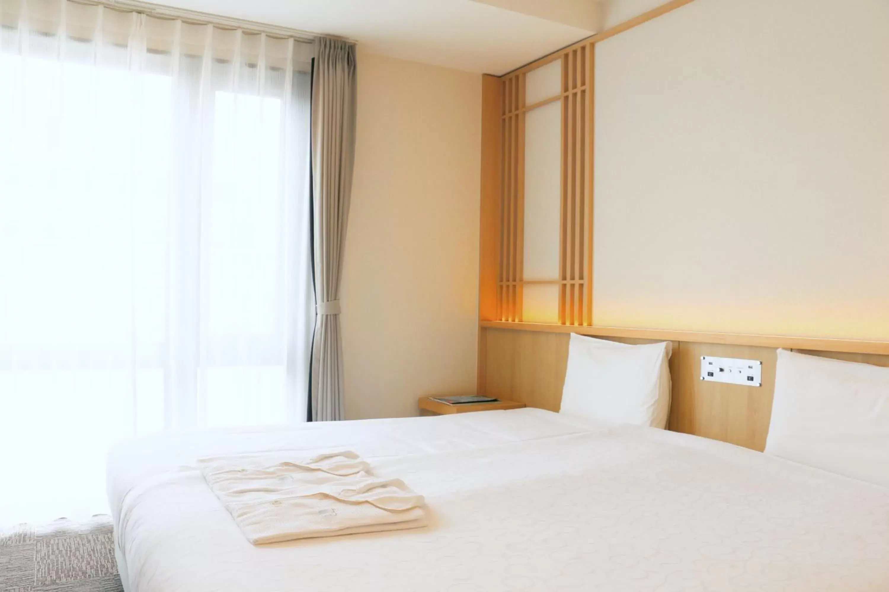 Bed in Henn na Hotel Kyoto Hachijoguchi
