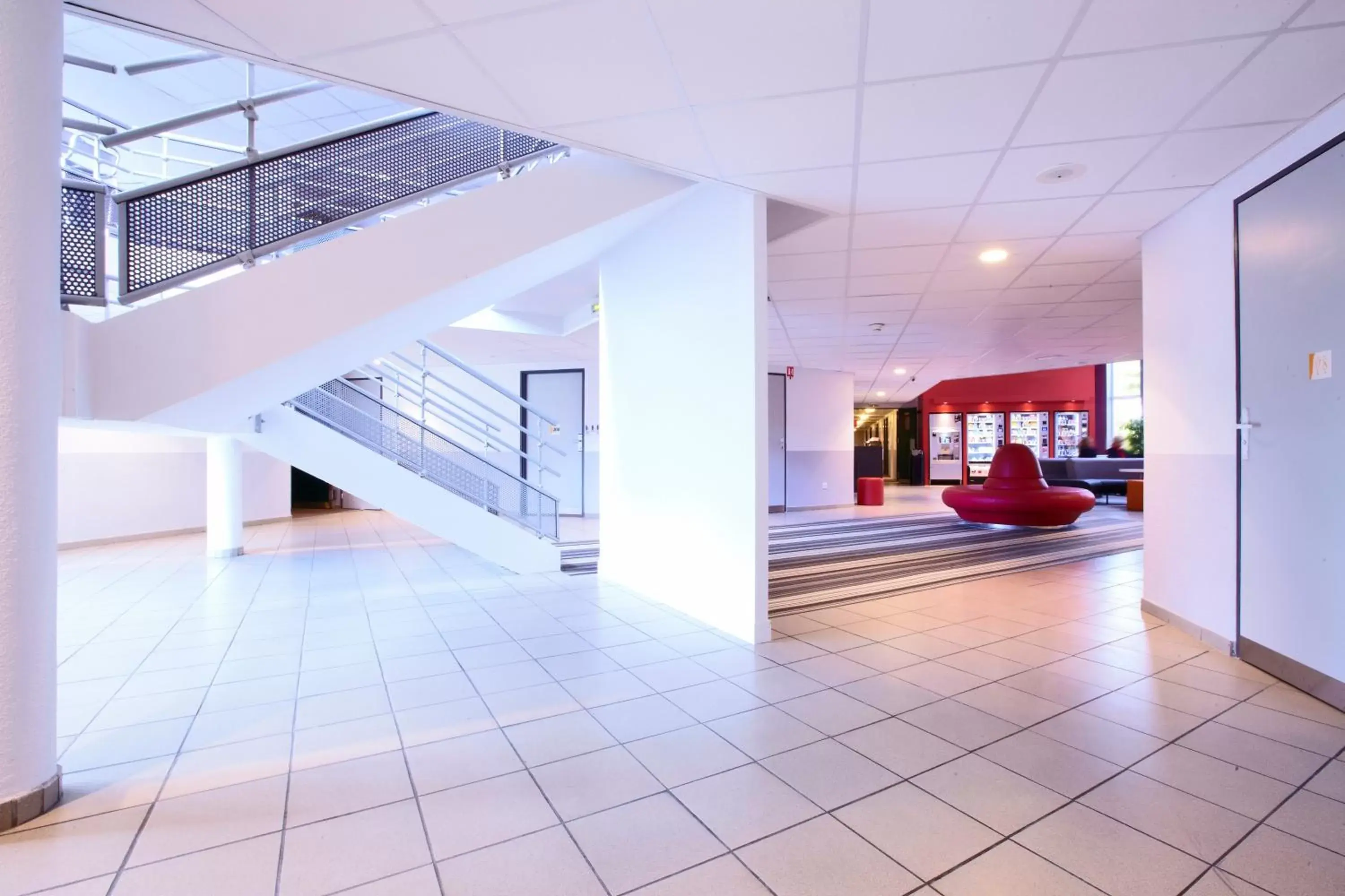 Lobby or reception in Premiere Classe Roissy CDG - Paris Nord 2 - Parc des Expositions Lobby or reception in Premiere Classe Roissy CDG - Paris Nord 2 - Parc des Expositions