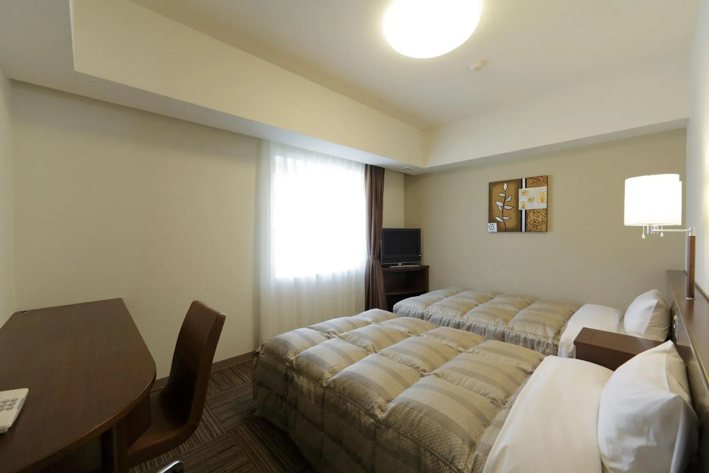 Photo of the whole room, Bed in Hotel Route Inn Sendaiizumi Inter