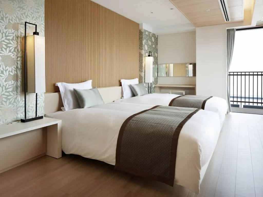 Bed in Kobe Minato Onsen Ren