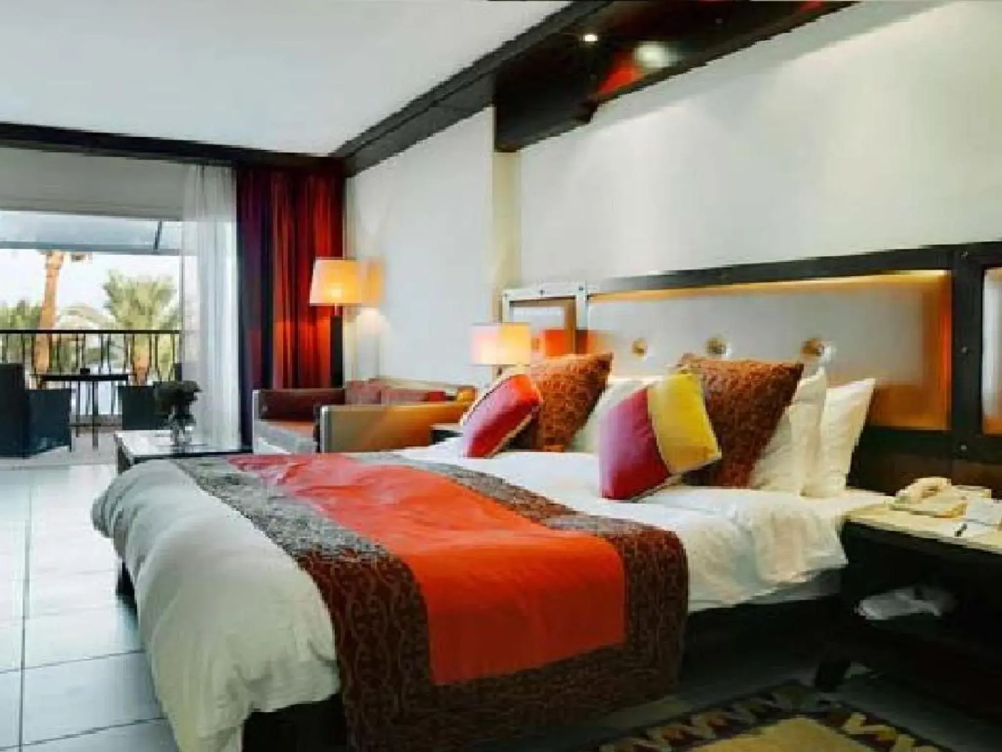 Photo of the whole room, Bed in Grand Rotana Resort & Spa