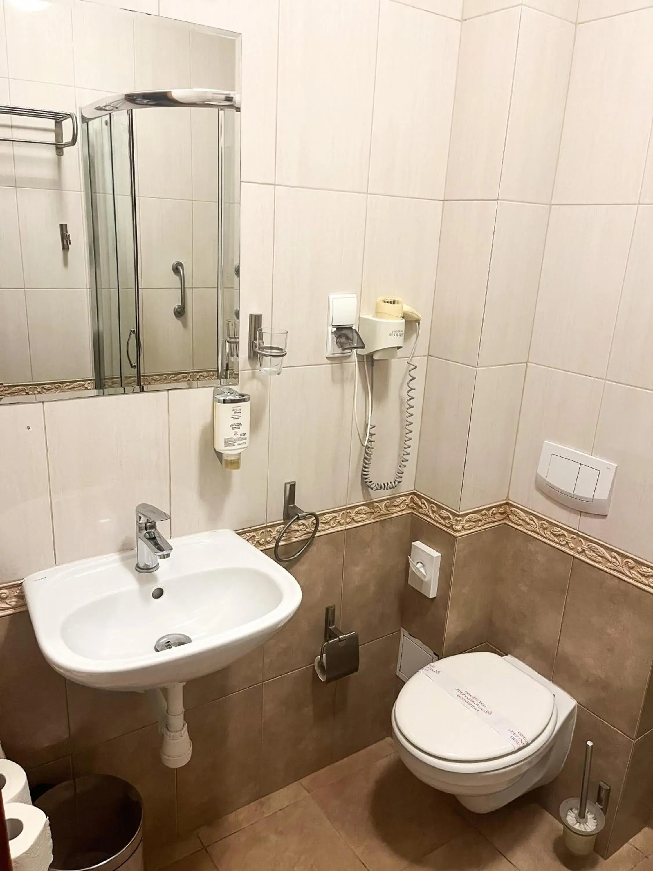Toilet, Bathroom in Hotel Logos