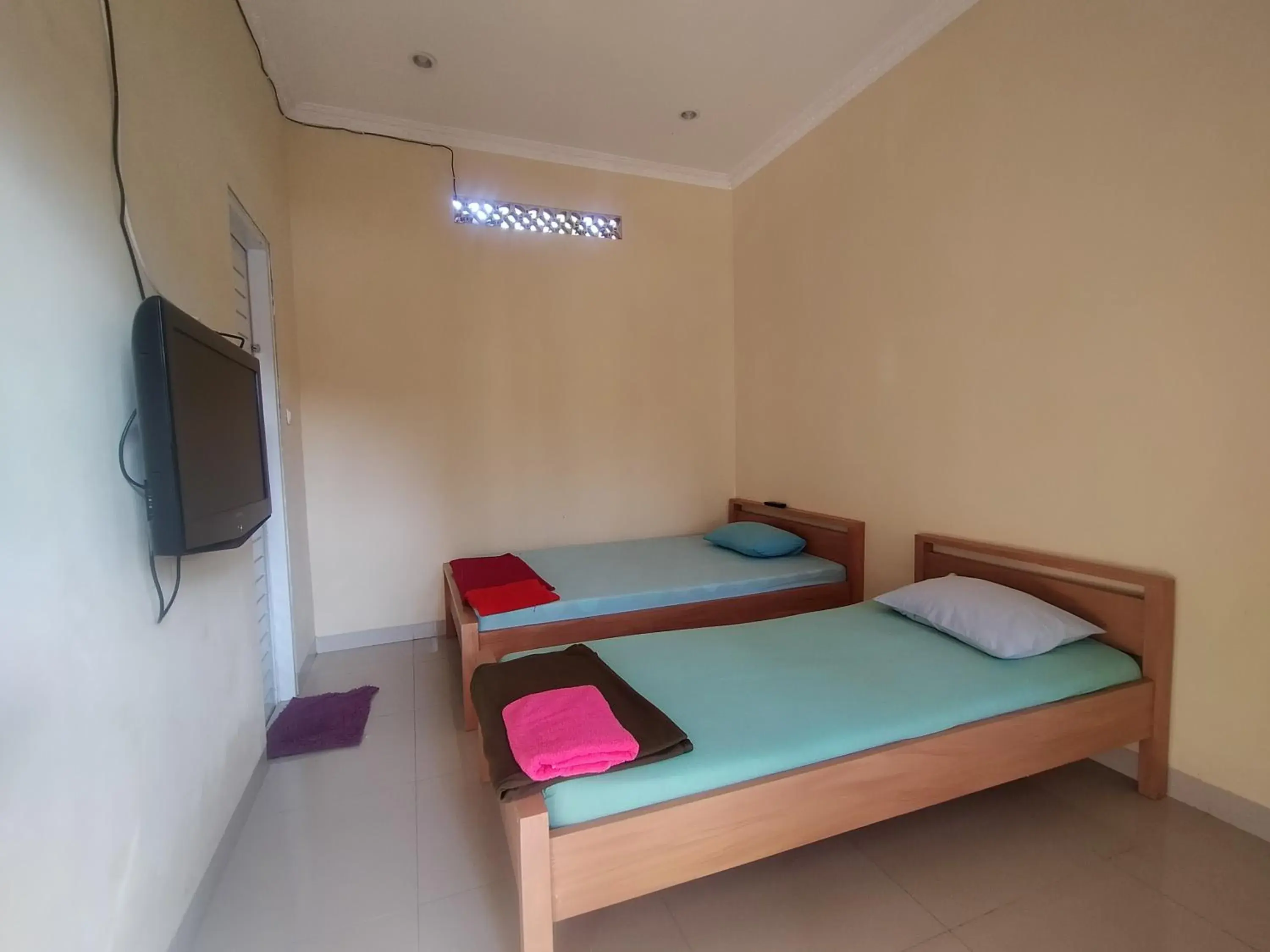 Bed in Villa Batu Tua Puncak