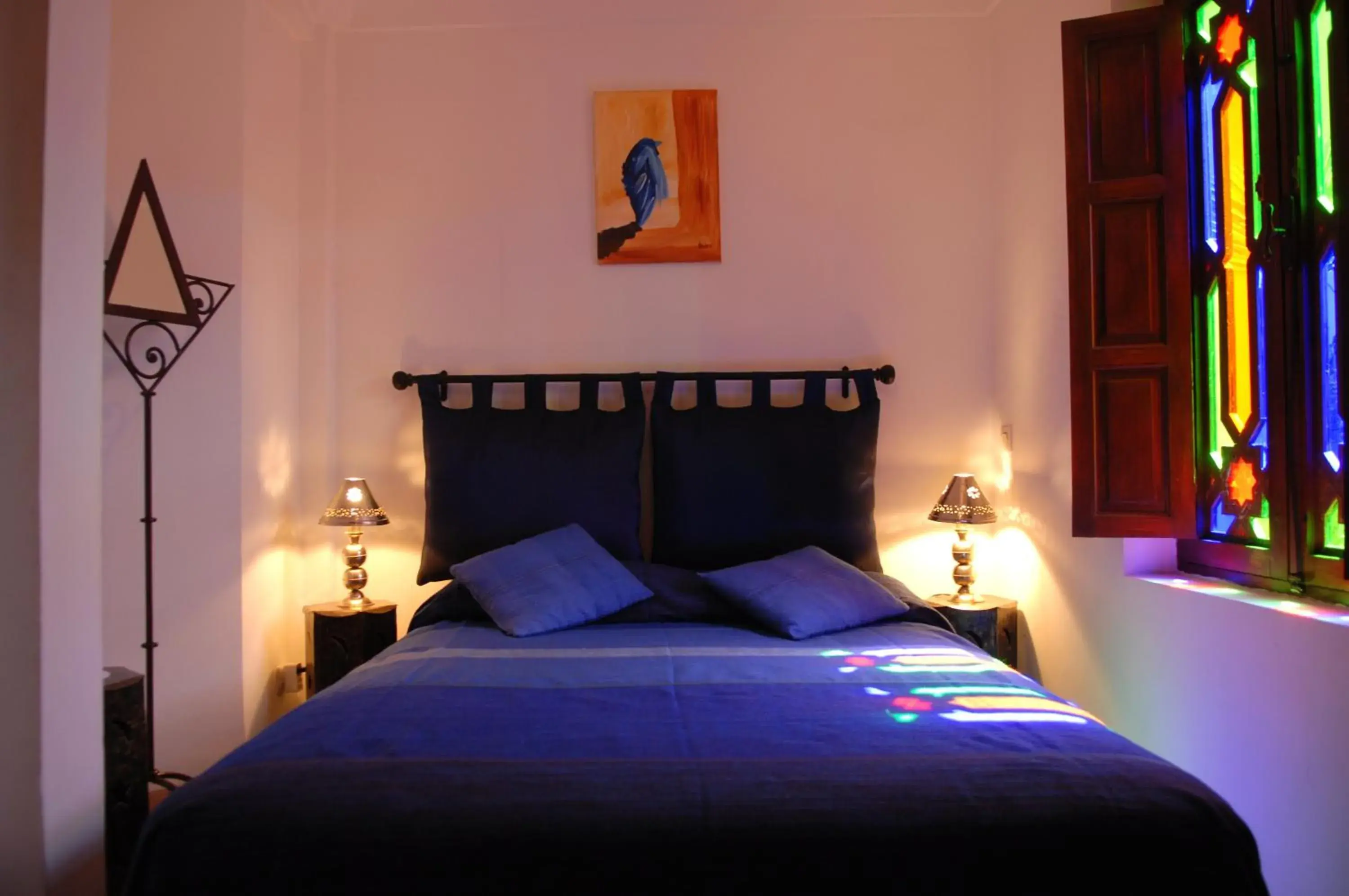 Bed in Riad Aubrac