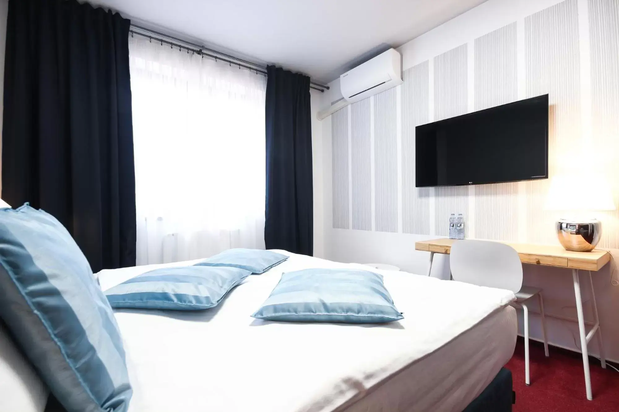 Standard Triple Room with Castle View in Hotel Maroli Mikulov Standard Triple Room with Castle View in Hotel Maroli Mikulov