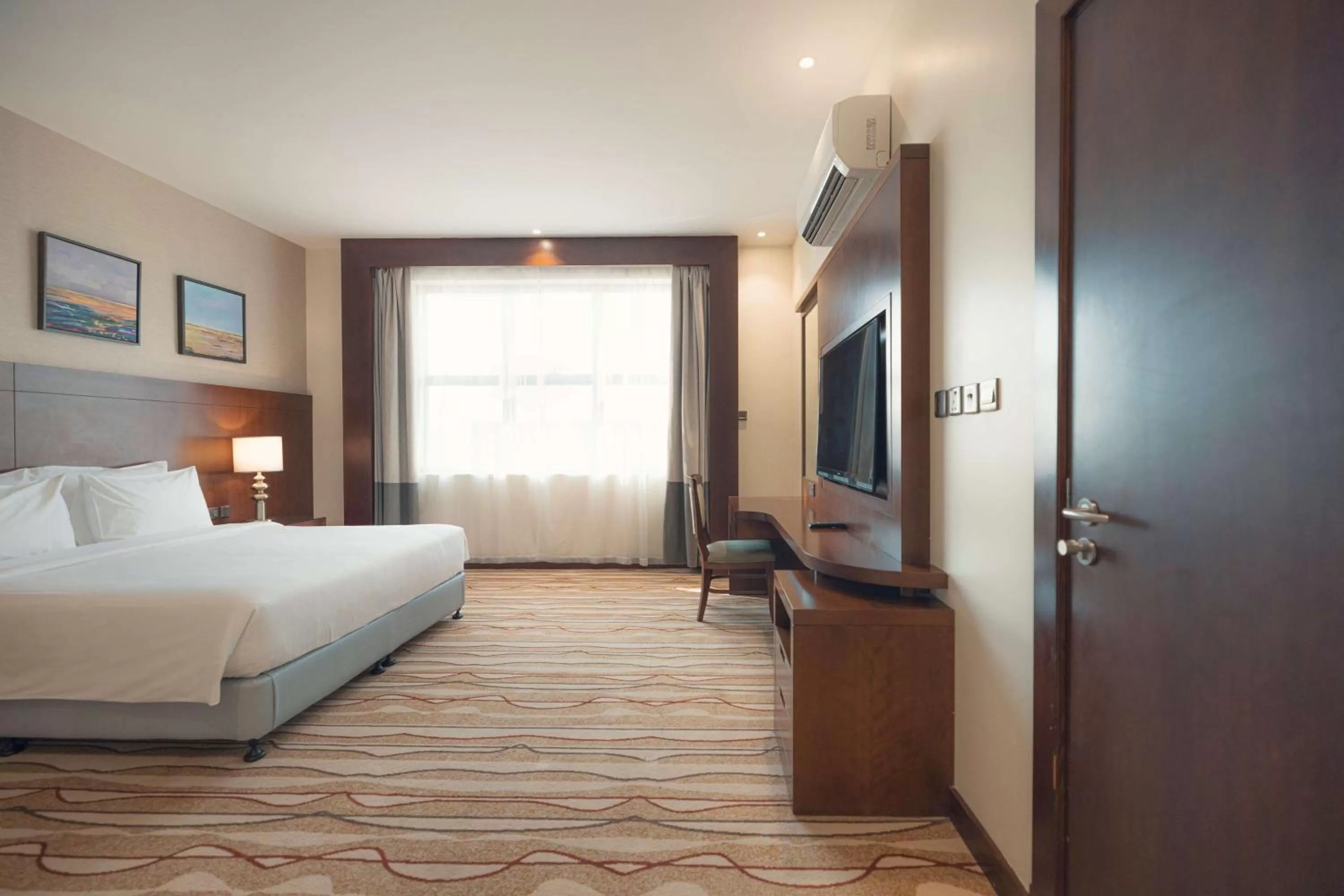 Photo of the whole room, Bed in Radisson Blu Hotel, Buraidah