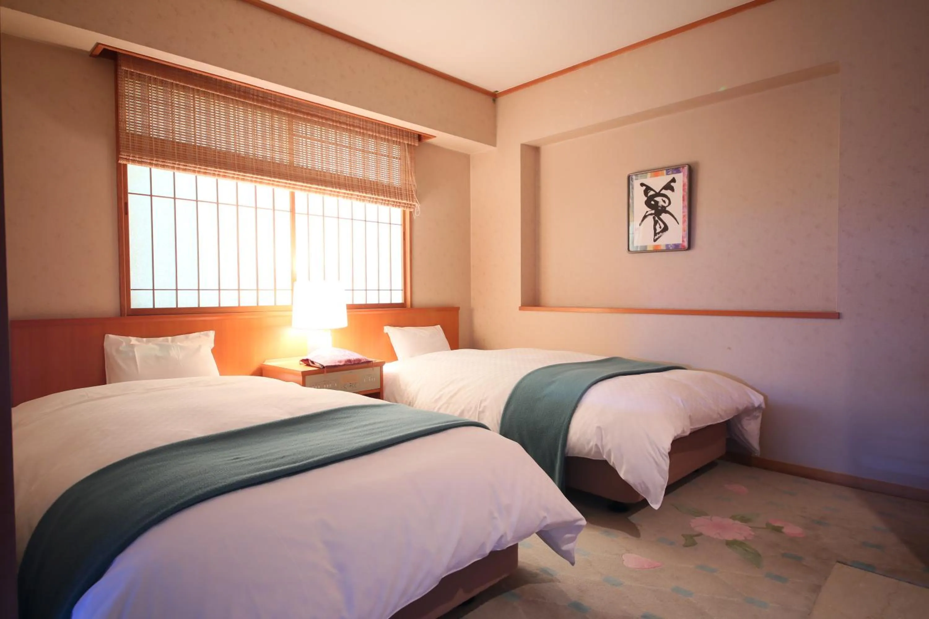 Bed in Hotel Tamanoyu