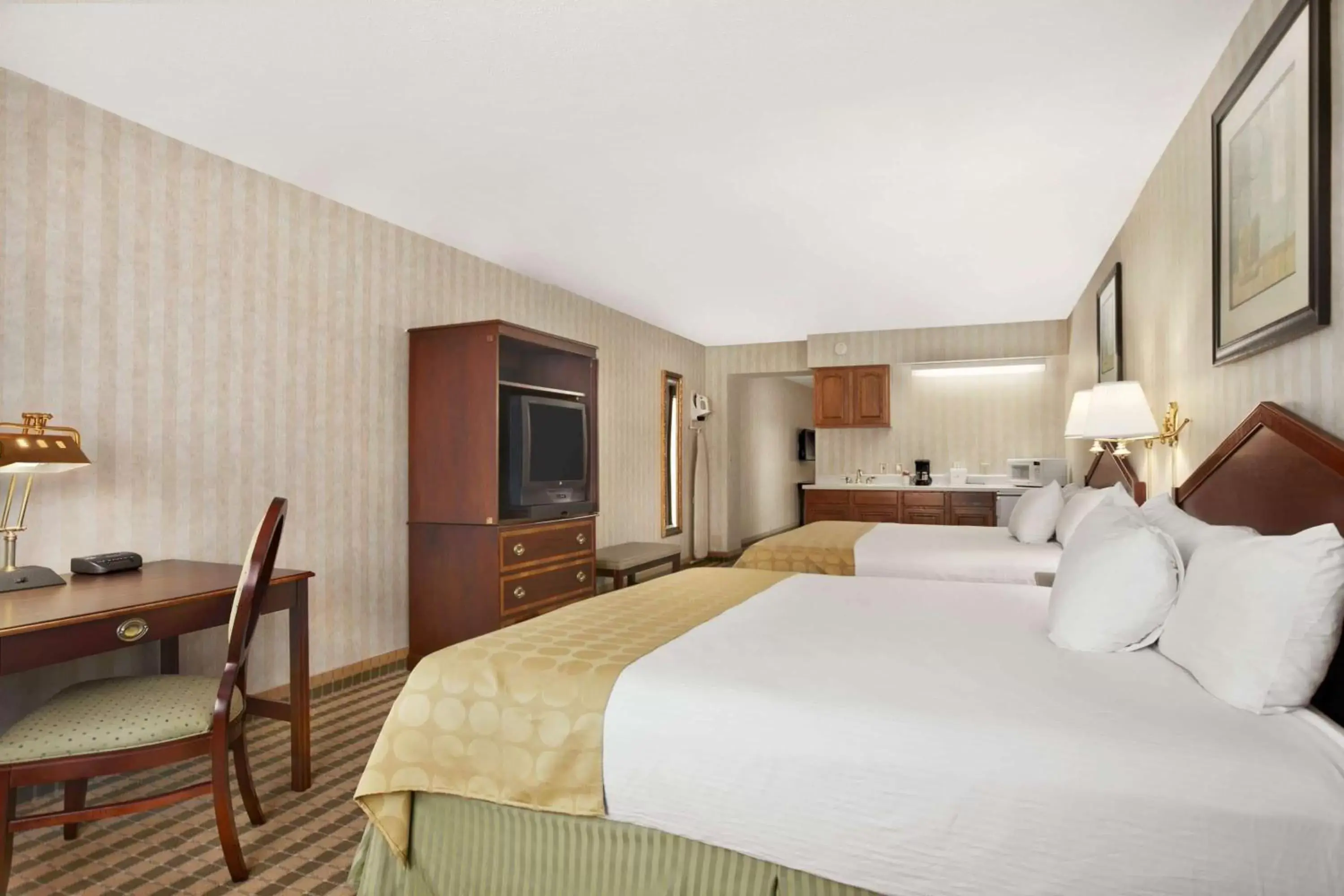 Photo of the whole room, Bed in Ramada by Wyndham Saginaw Hotel & Suites