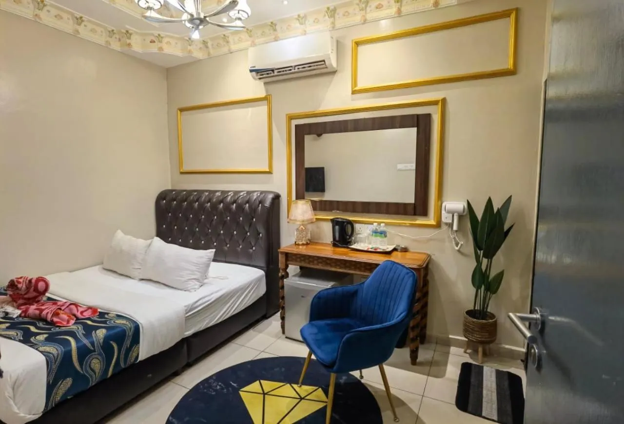 Bed in Ghazrin's Classic Hotel JB