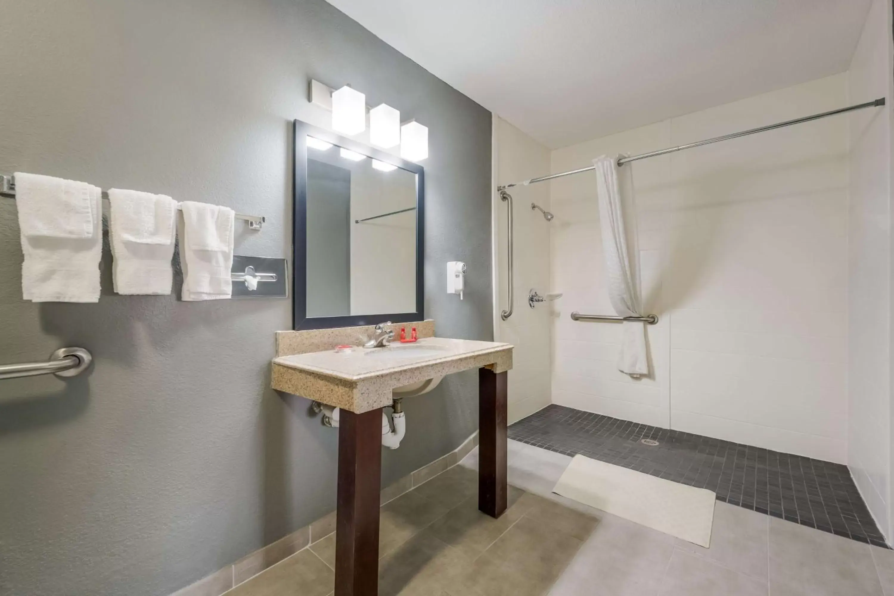 Bathroom in SureStay Hotel by Best Western Deer Park