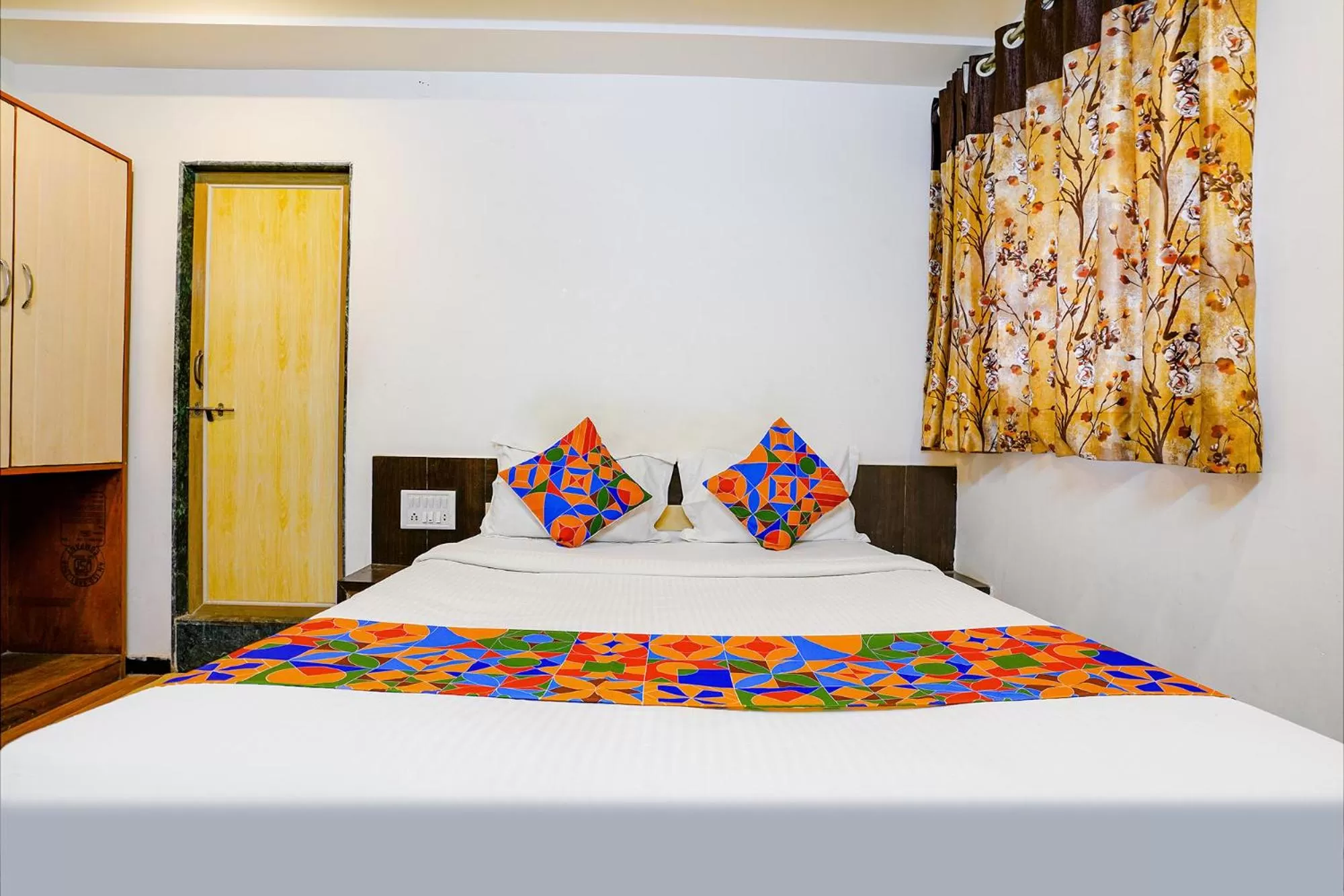 Bed in FabHotel Sai Chatra