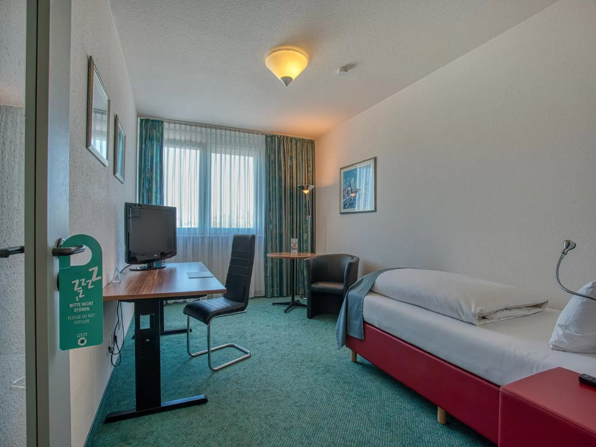 Seating area, TV/Entertainment Center in Centro Hotel Böblingen