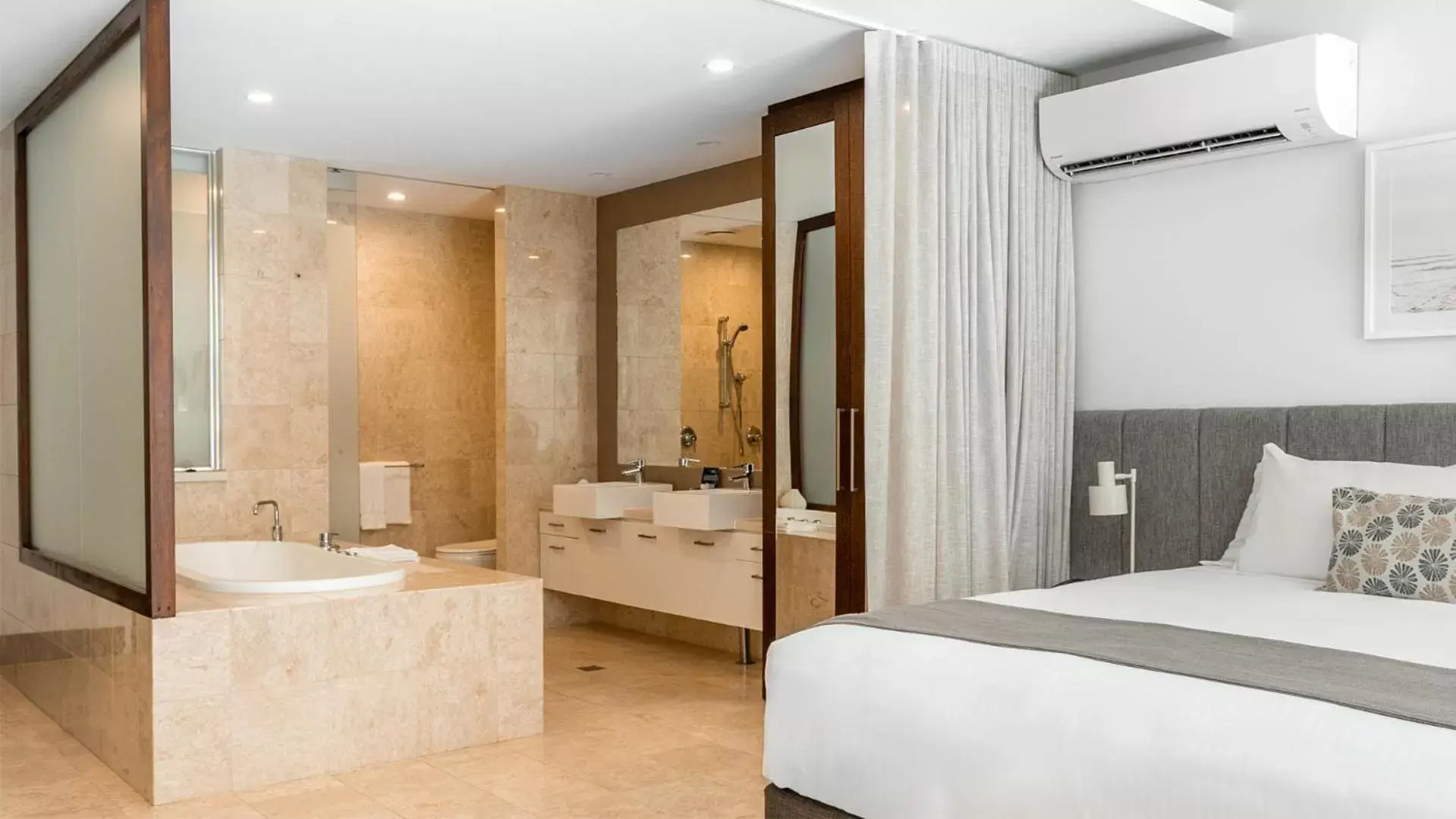Bed, Bathroom in Oaks Casuarina Santai Resort