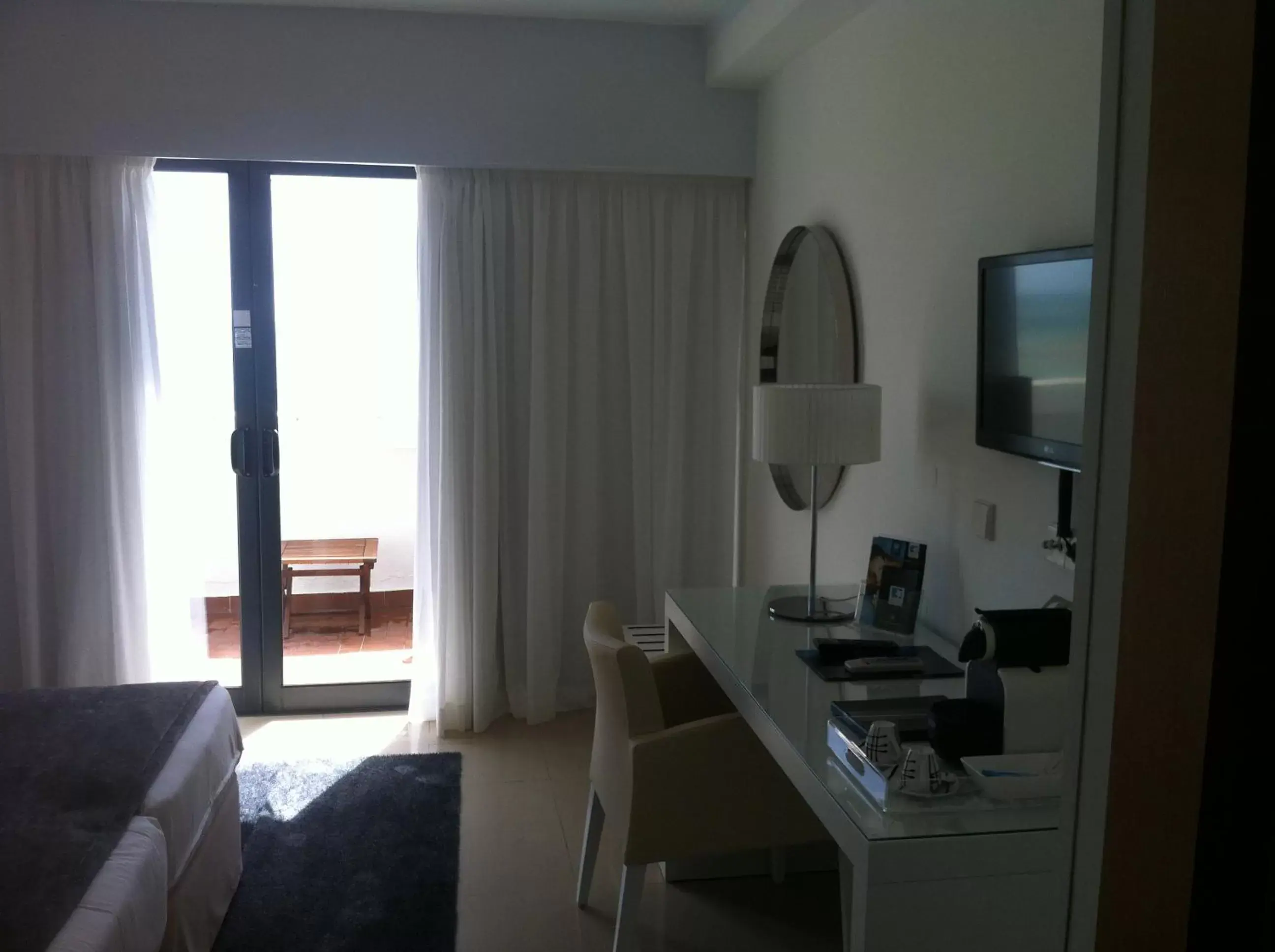 Bedroom, TV/Entertainment Center in Rocamar Exclusive Hotel & Spa - Adults Only