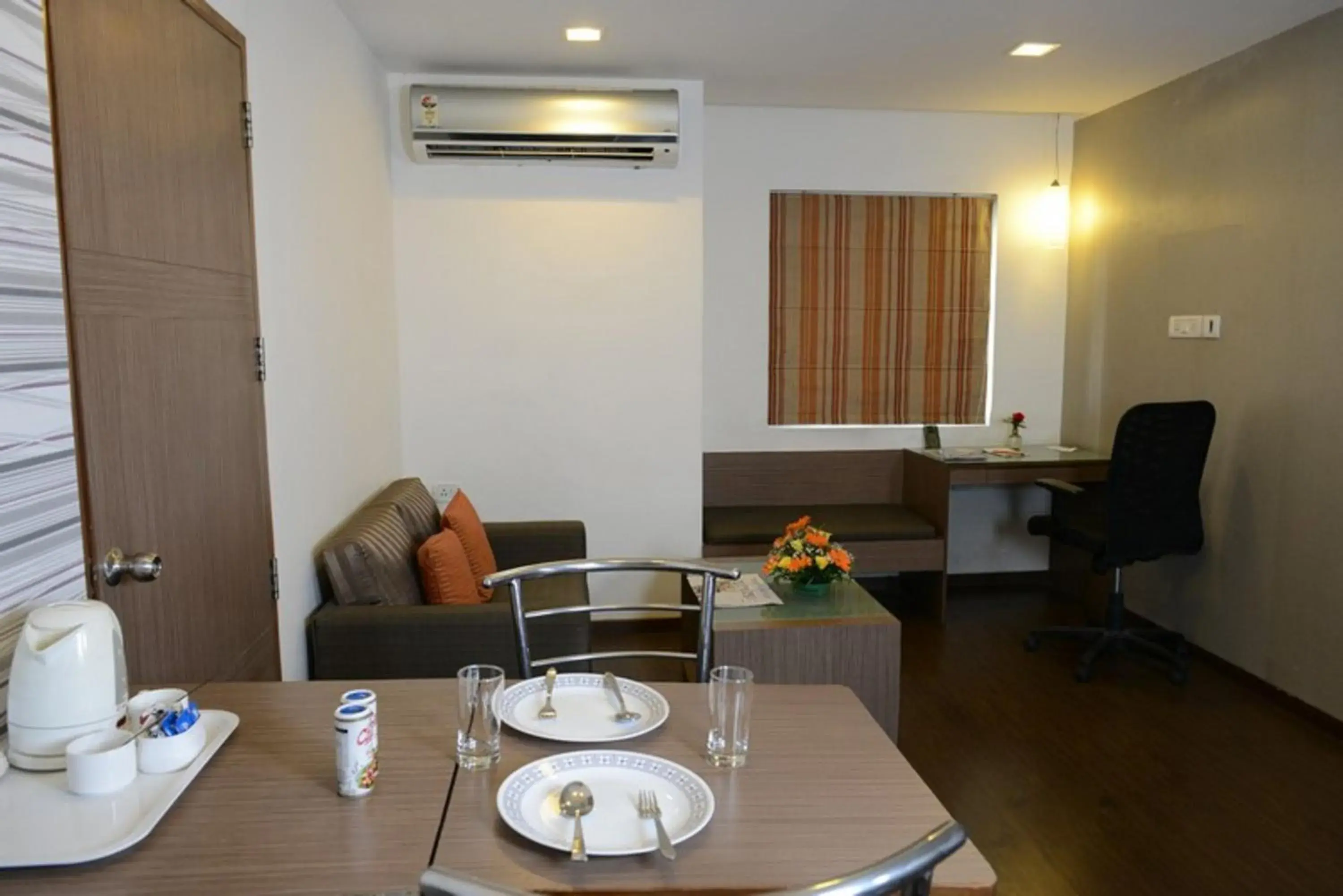 Living room, Seating Area in The Lotus Apartment hotel, Burkit Road