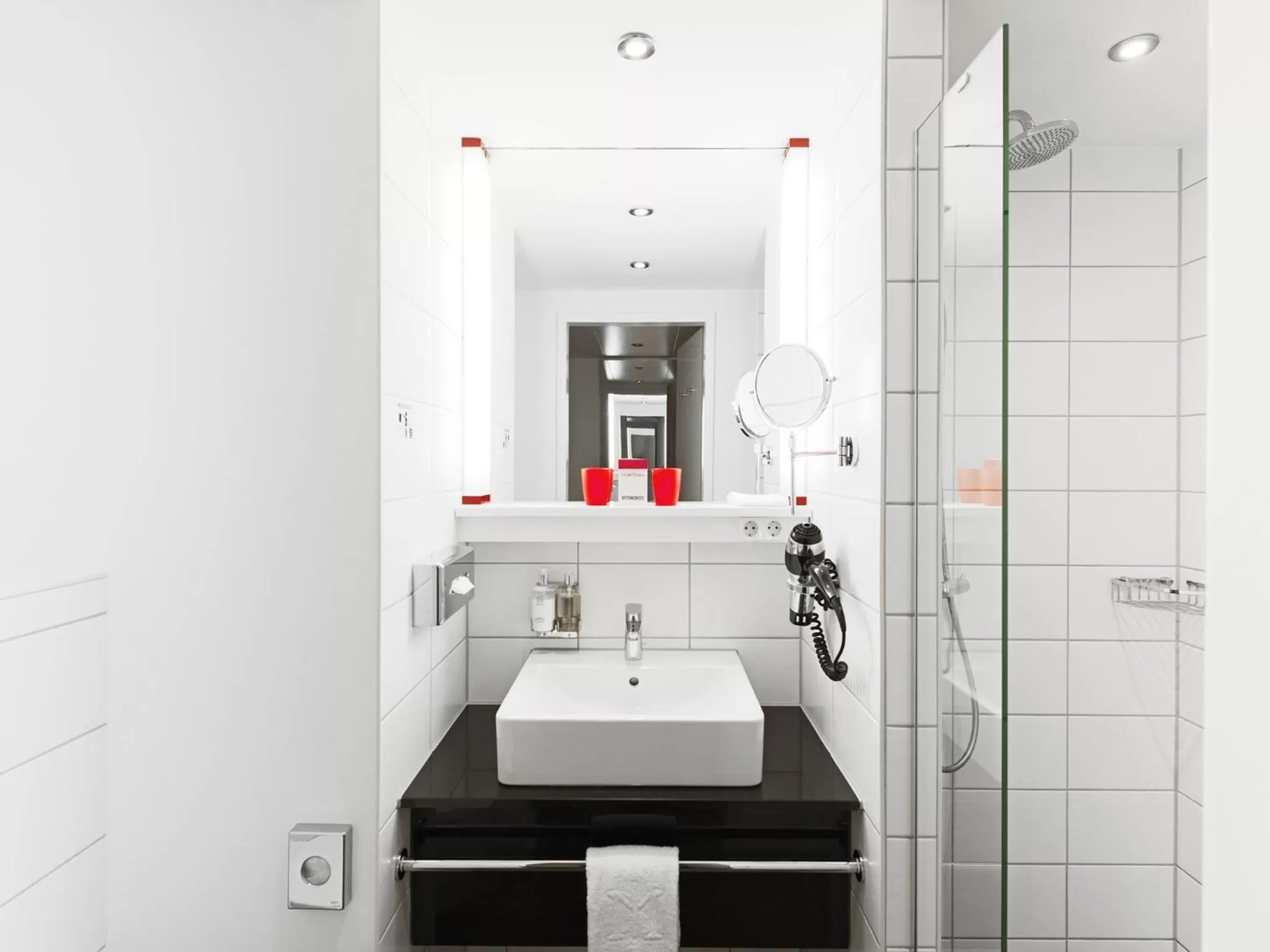 Bathroom in DORMERO Hotel Frankfurt