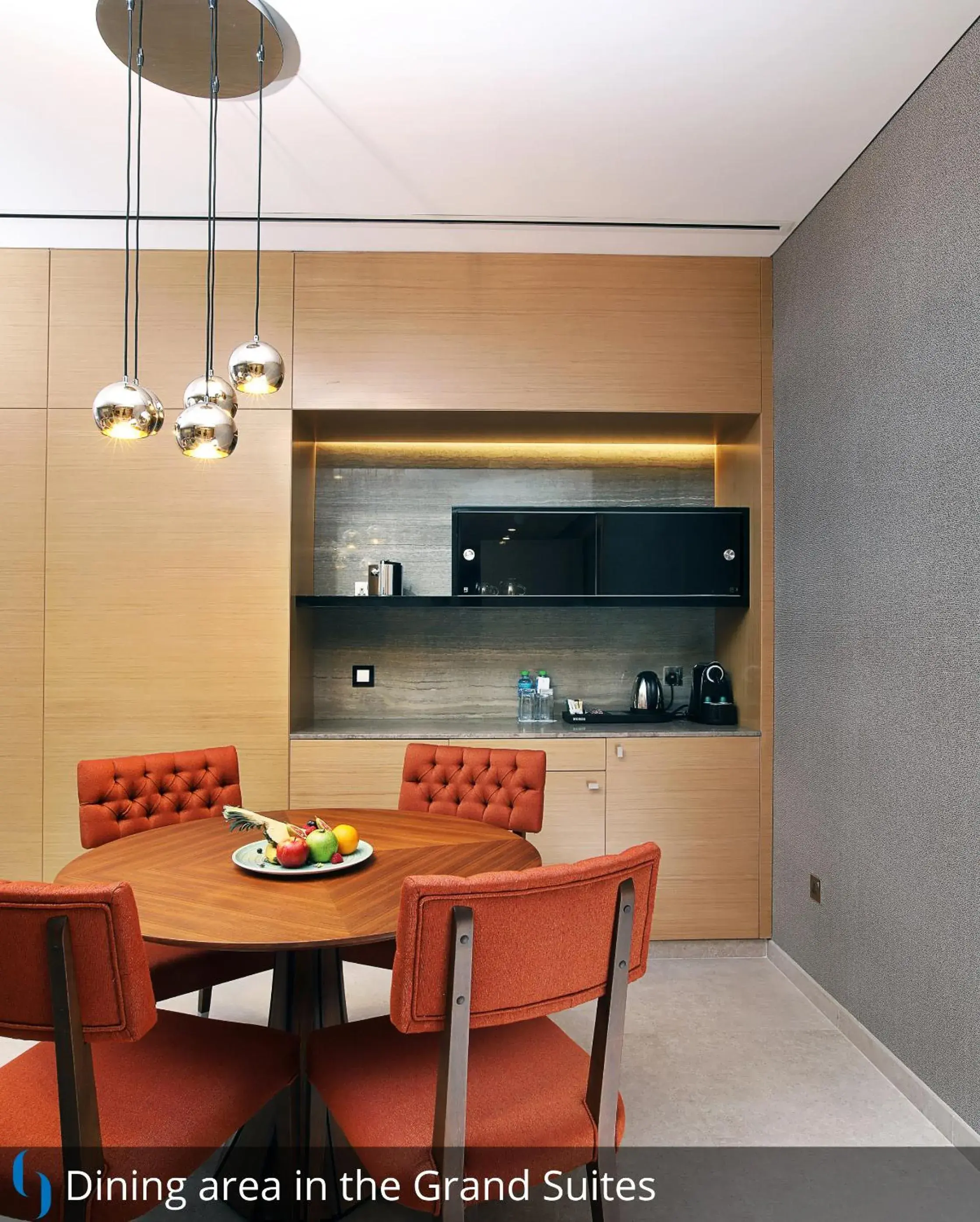 Living room, Dining Area in Grand Cosmopolitan Hotel