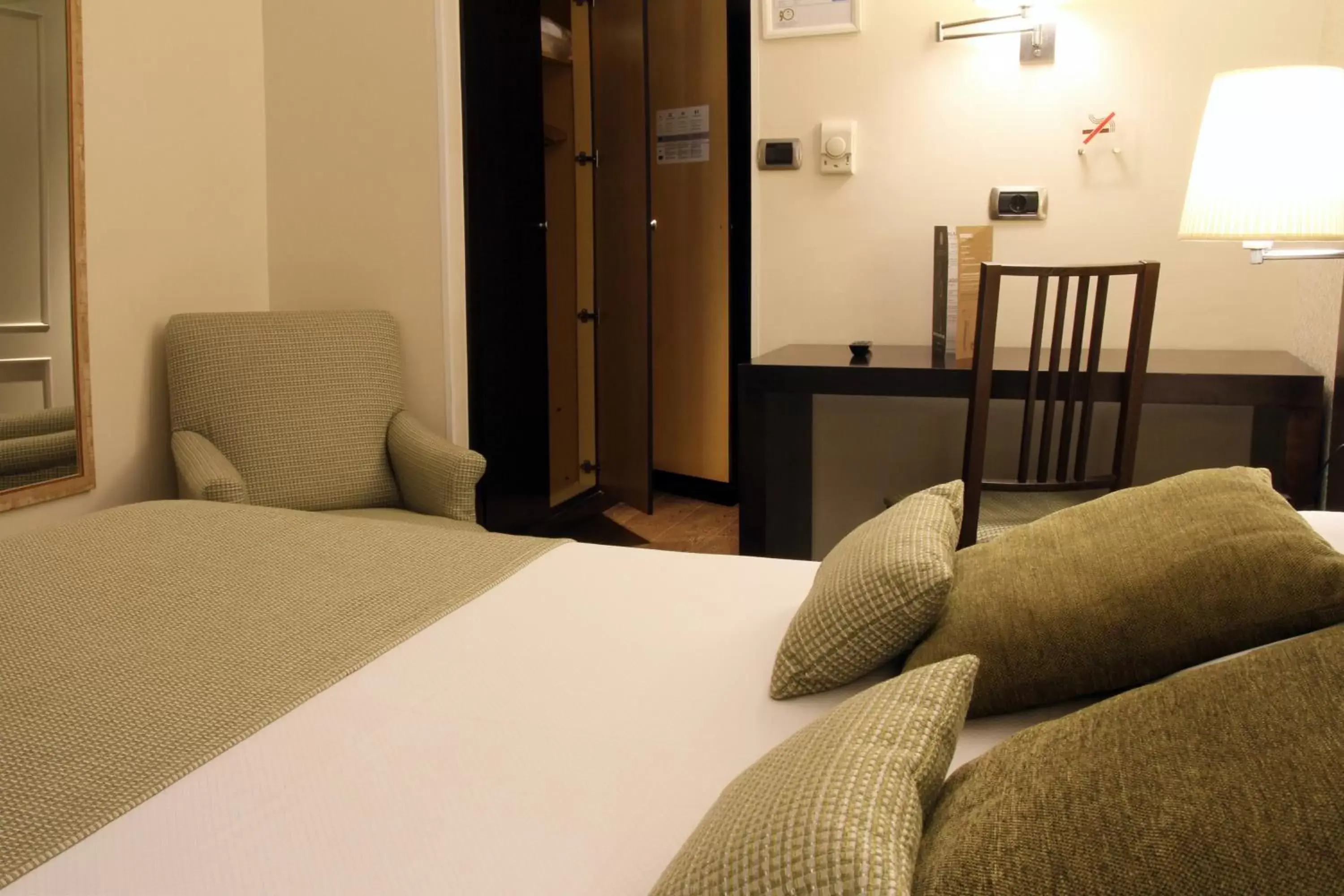 Photo of the whole room, Bed in Hotel Conde Duque Bilbao Photo of the whole room, Bed in Hotel Conde Duque Bilbao