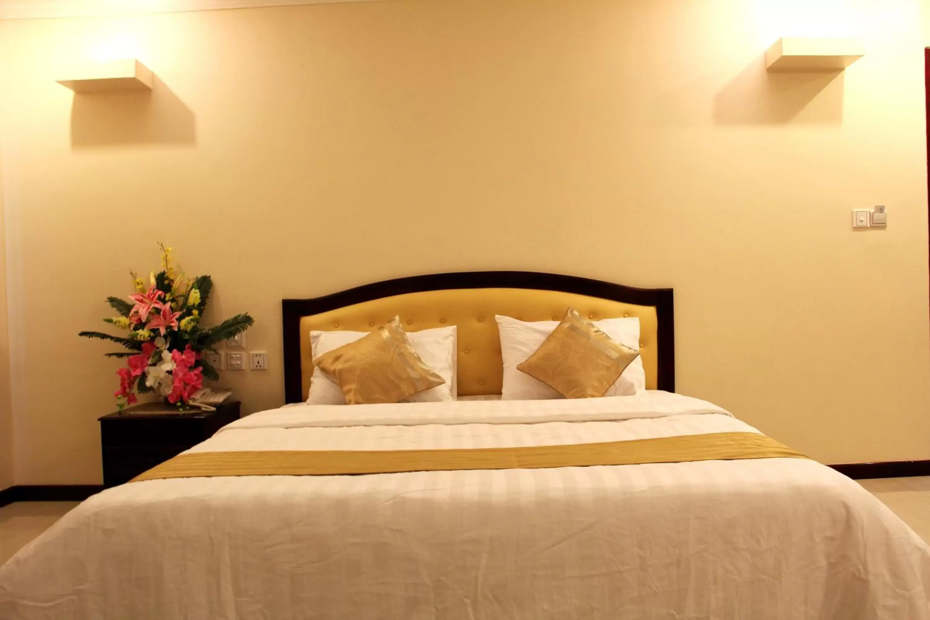 Bed in Good Luck Day Hotel & Apartment